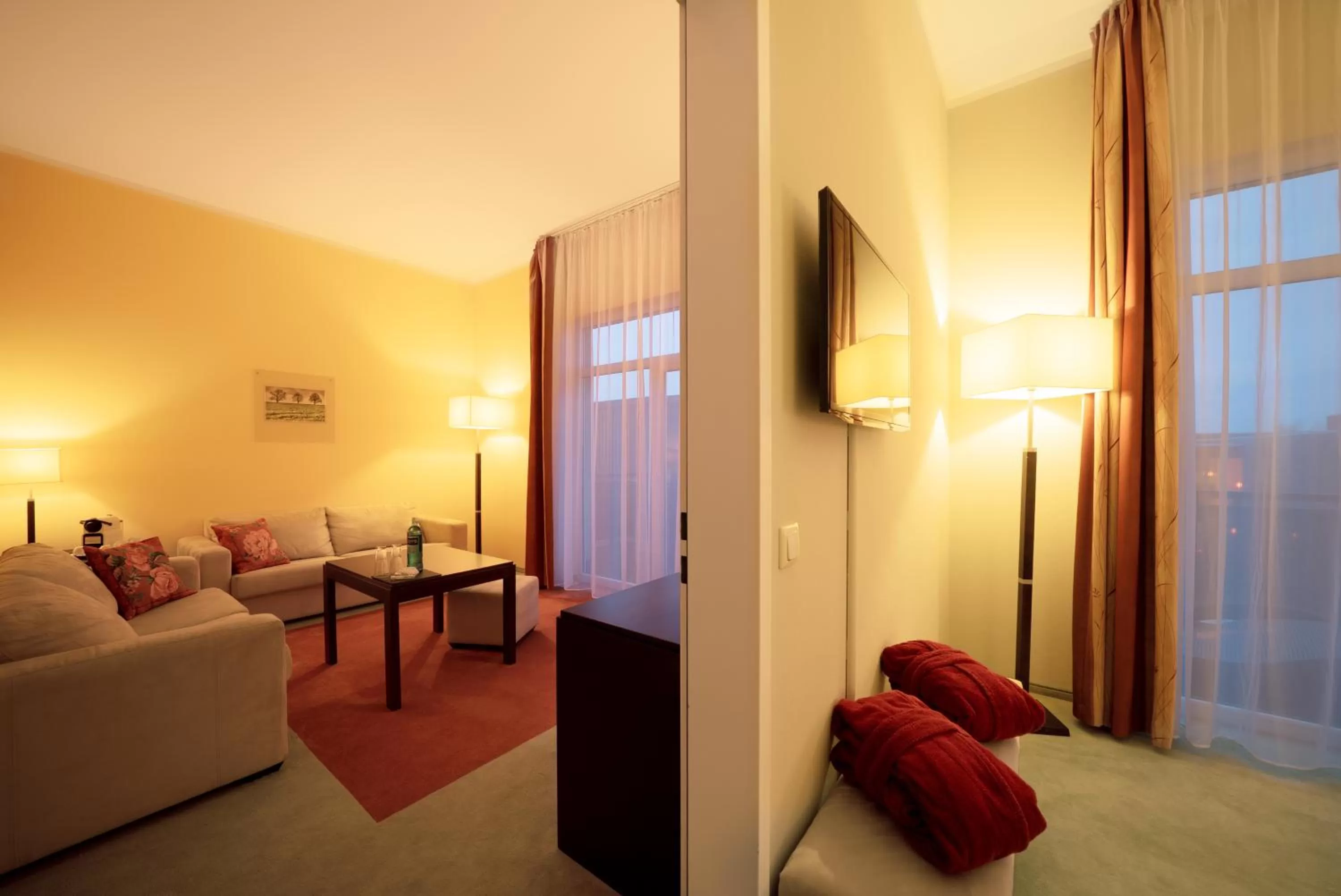 Living room, Bed in Resort Mark Brandenburg & Fontane Therme