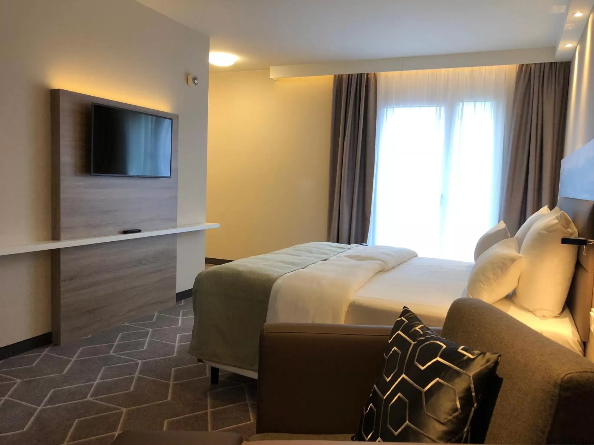 Bedroom, Bed in Holiday Inn Express Munich - City East by IHG