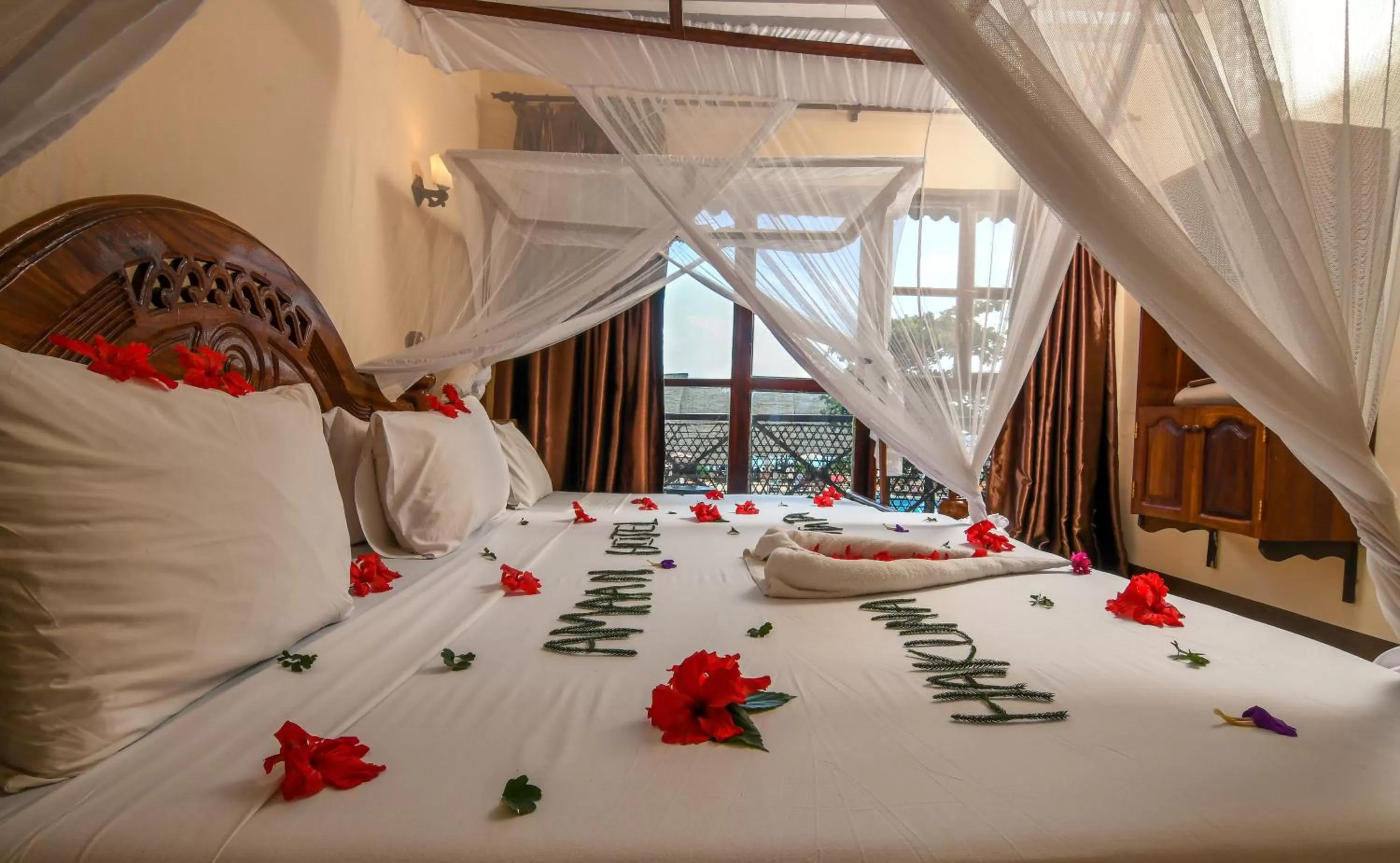 Bed in Amaan Beach Bungalows