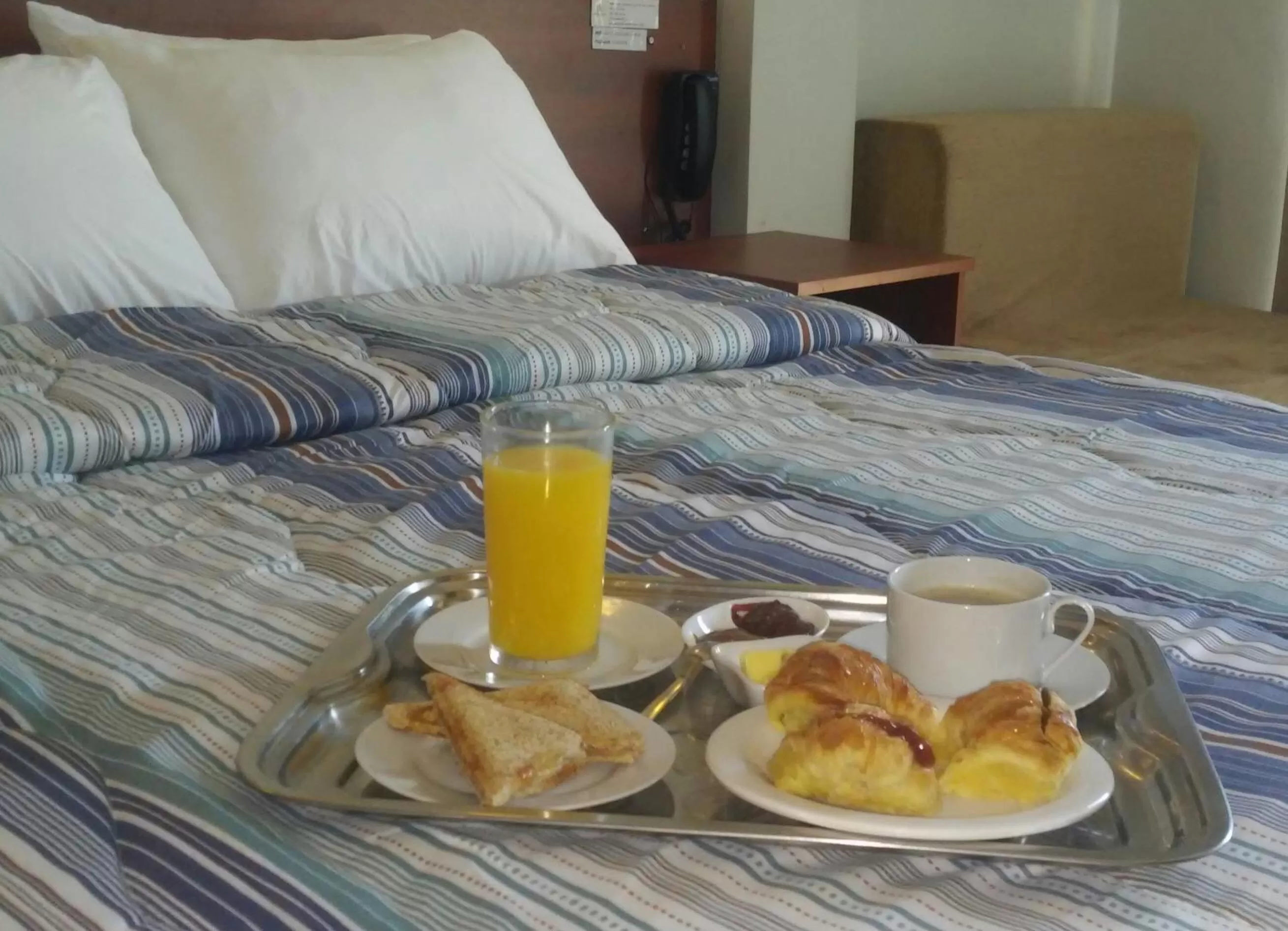 Bed in Madame Lynch Hotel Asuncion