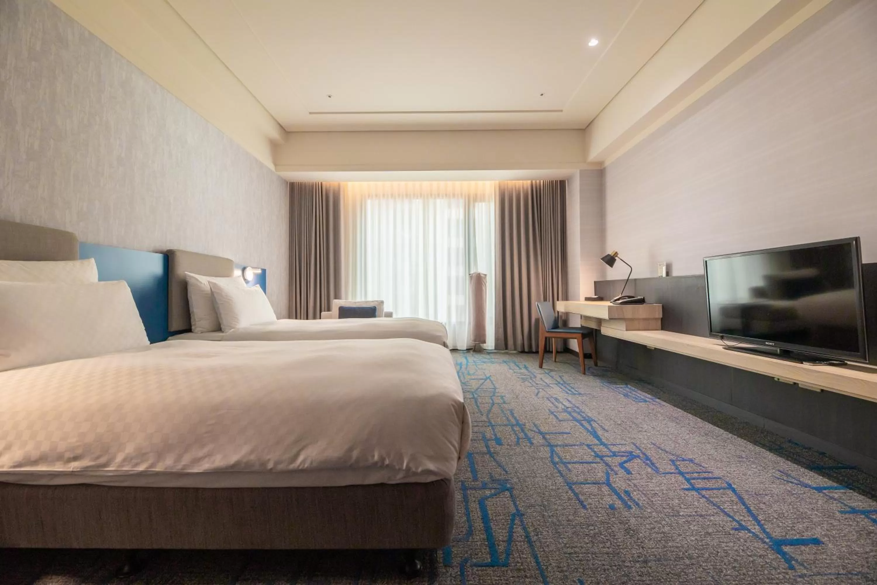 Photo of the whole room, Bed in Miramar Garden Taipei