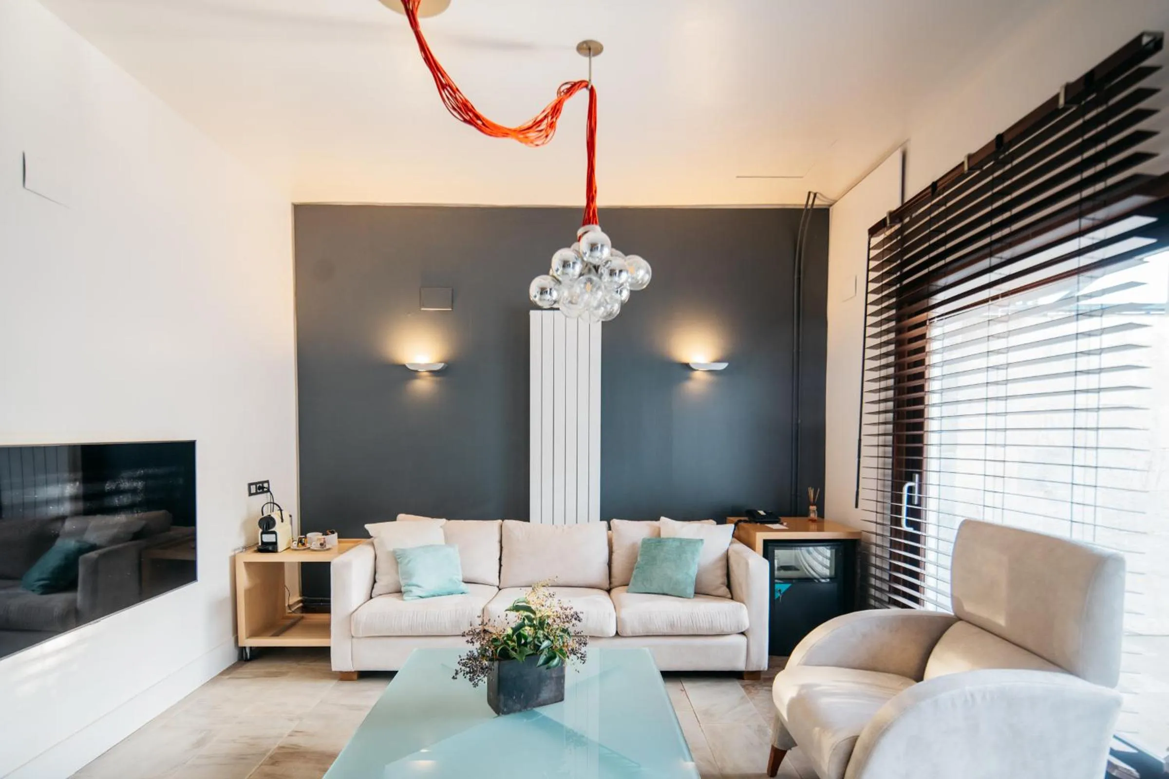 Living room, Bed in Hotel Boutique Mas Passamaner