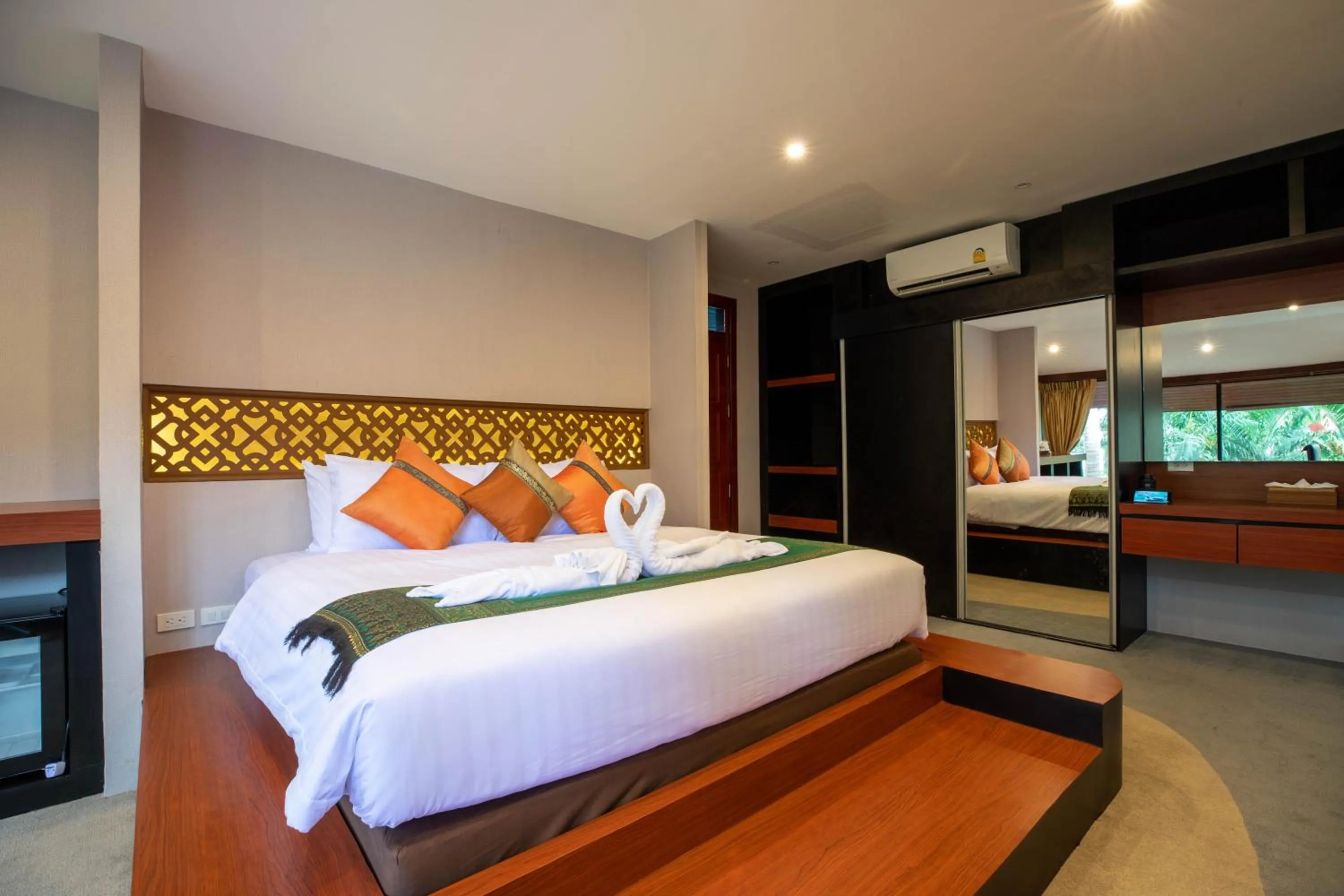 Bedroom, Bed in Royal Phawadee Village Patong - 2 Minutes walk to the beach