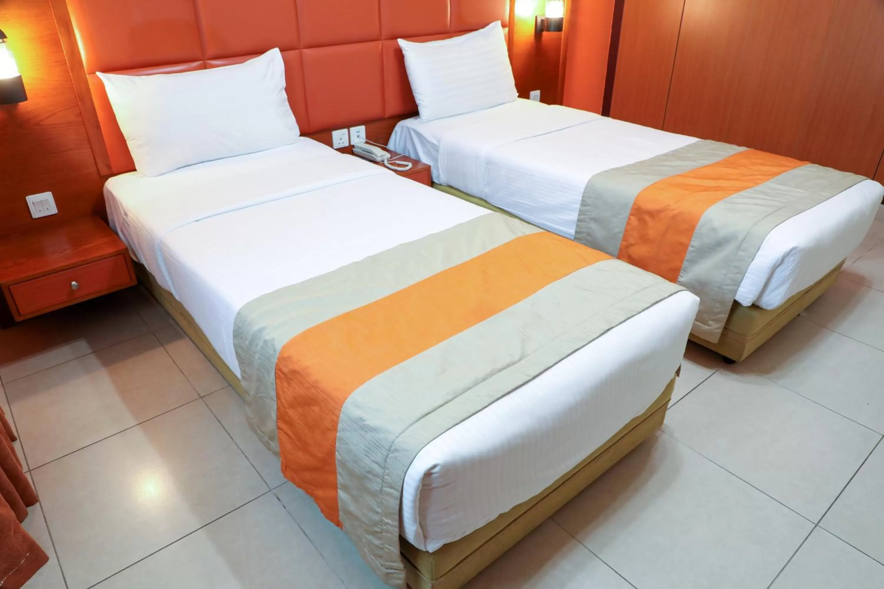 Bed in Wescott Plaza Hotel Apartments LLC Formerly West Zone Plaza Hotel Apts