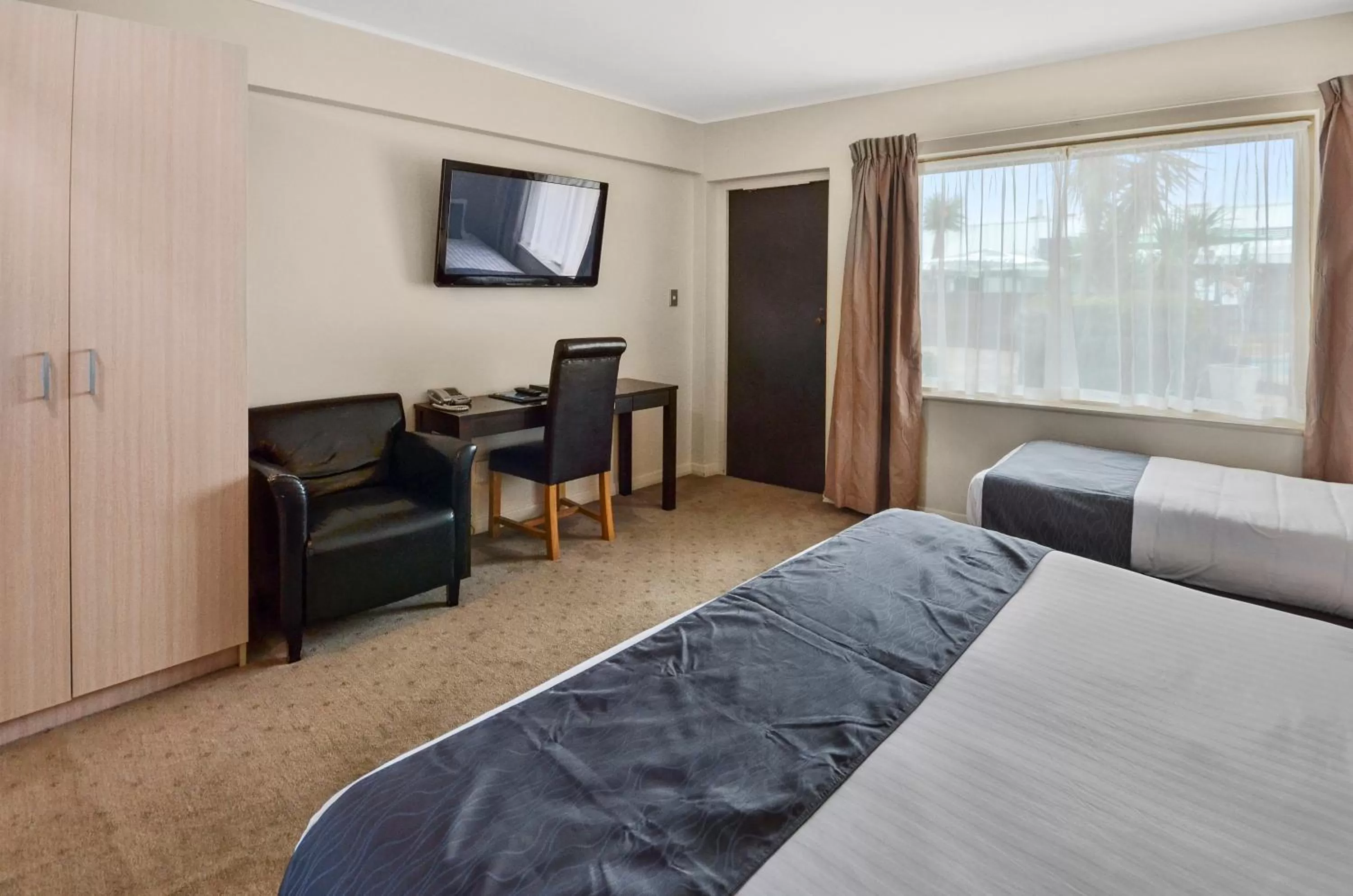 Bed in Poenamo Hotel