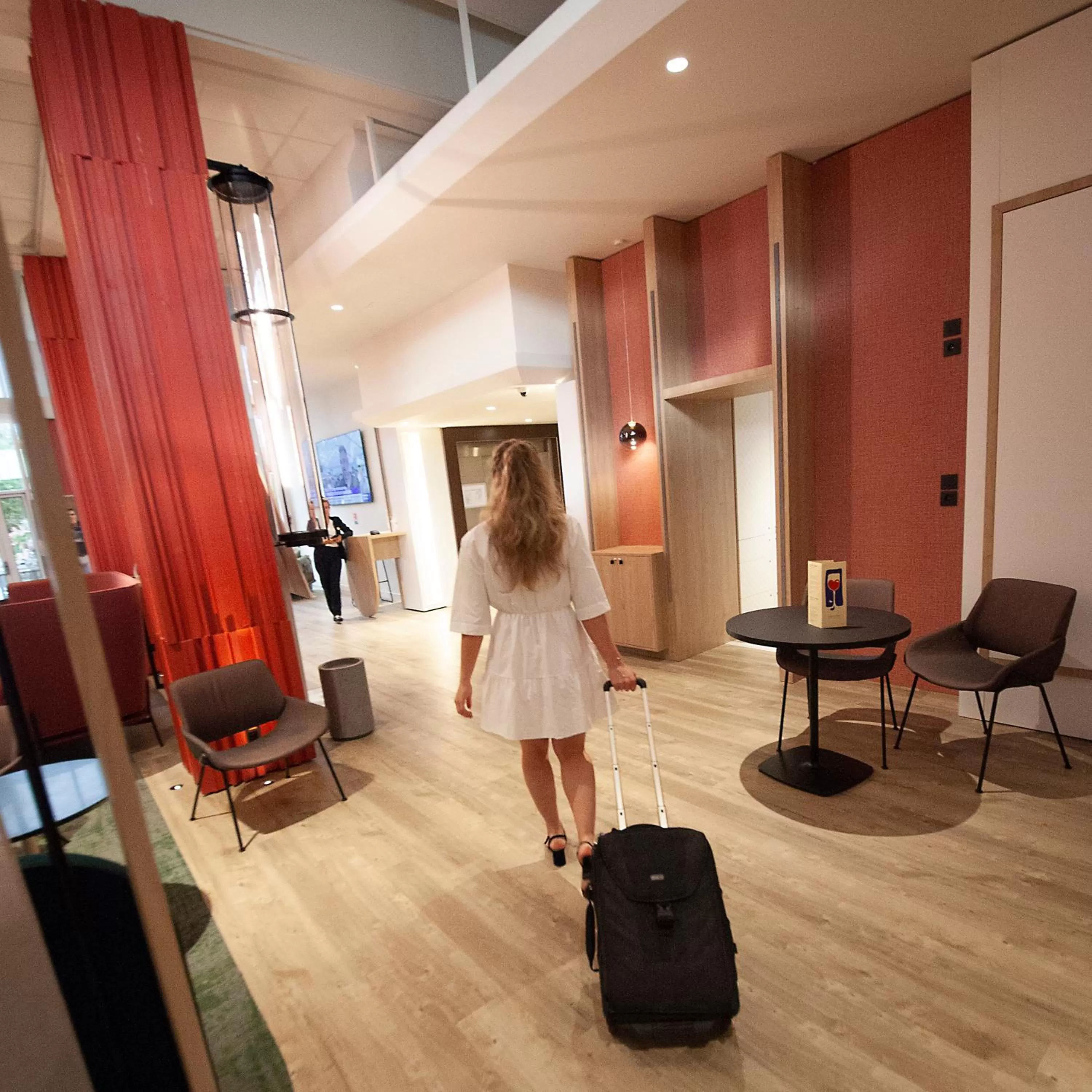 Lobby or reception in Novotel Clermont-Ferrand