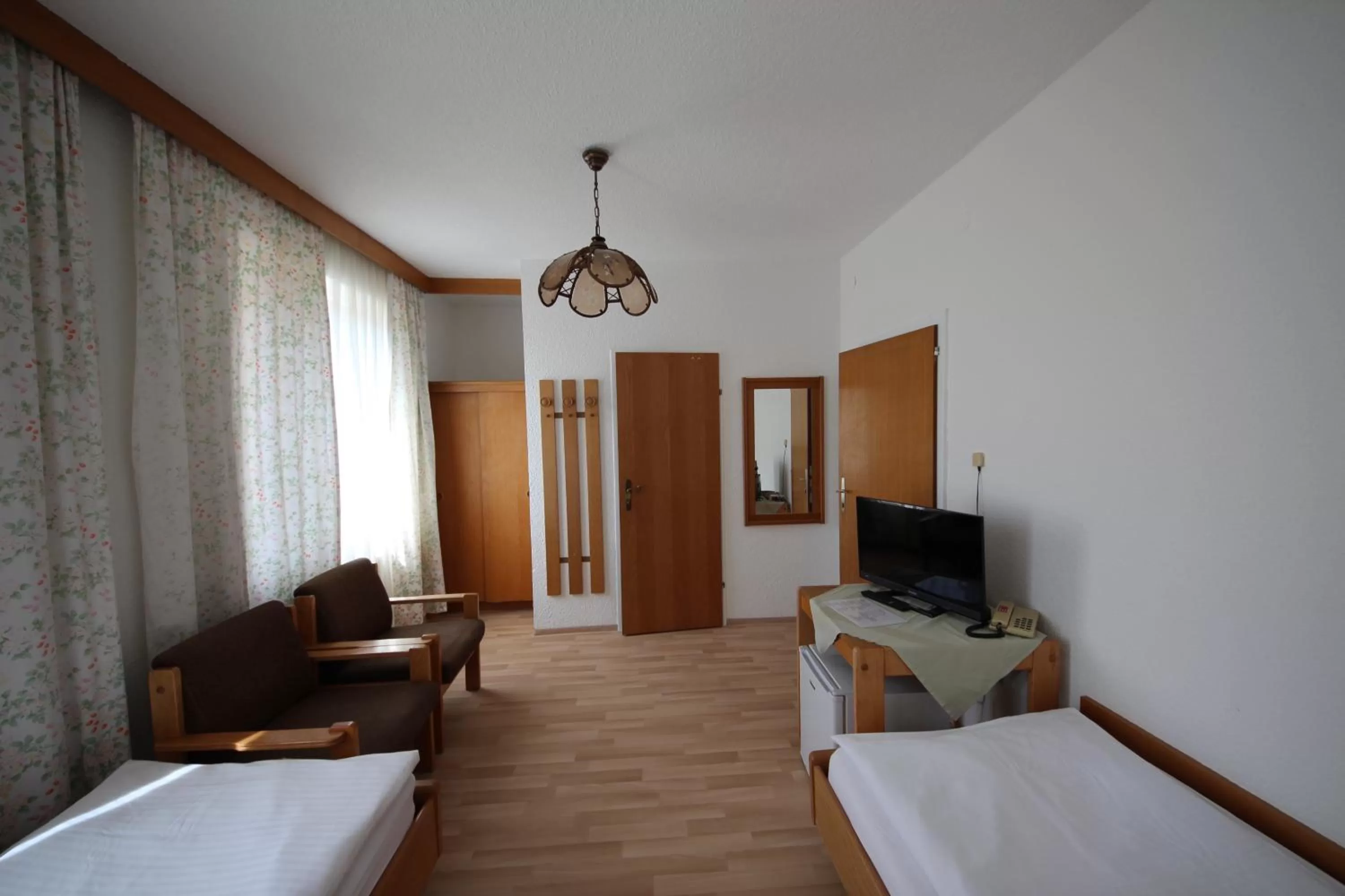 Photo of the whole room, Bed in Hotel Kleinmünchen