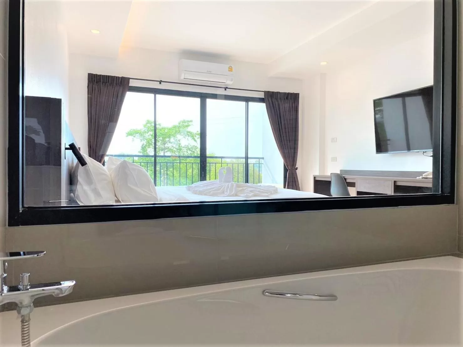 Photo of the whole room in GEEN Hotel Chonburi