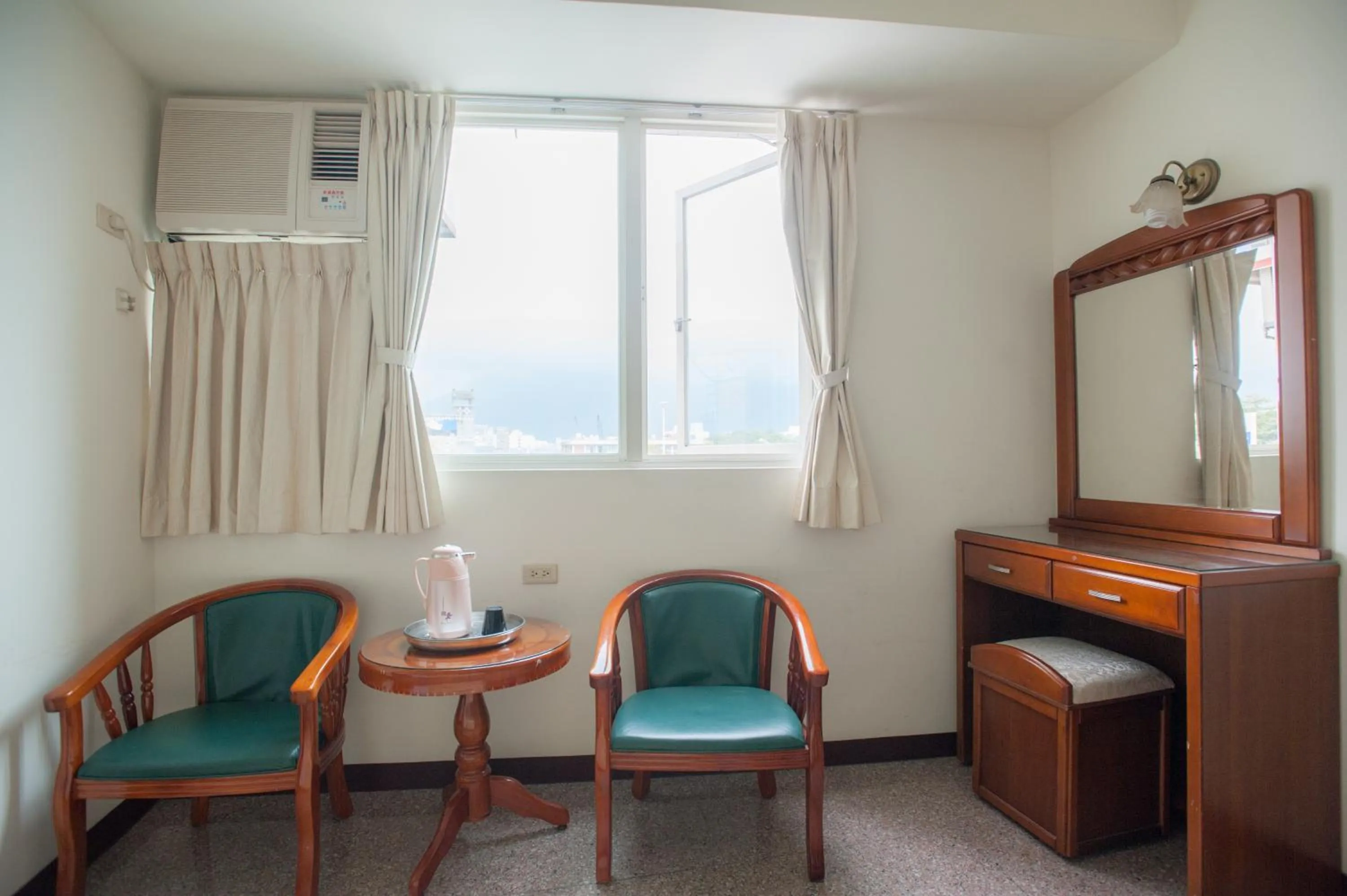 Seating area in Chantai Hotel