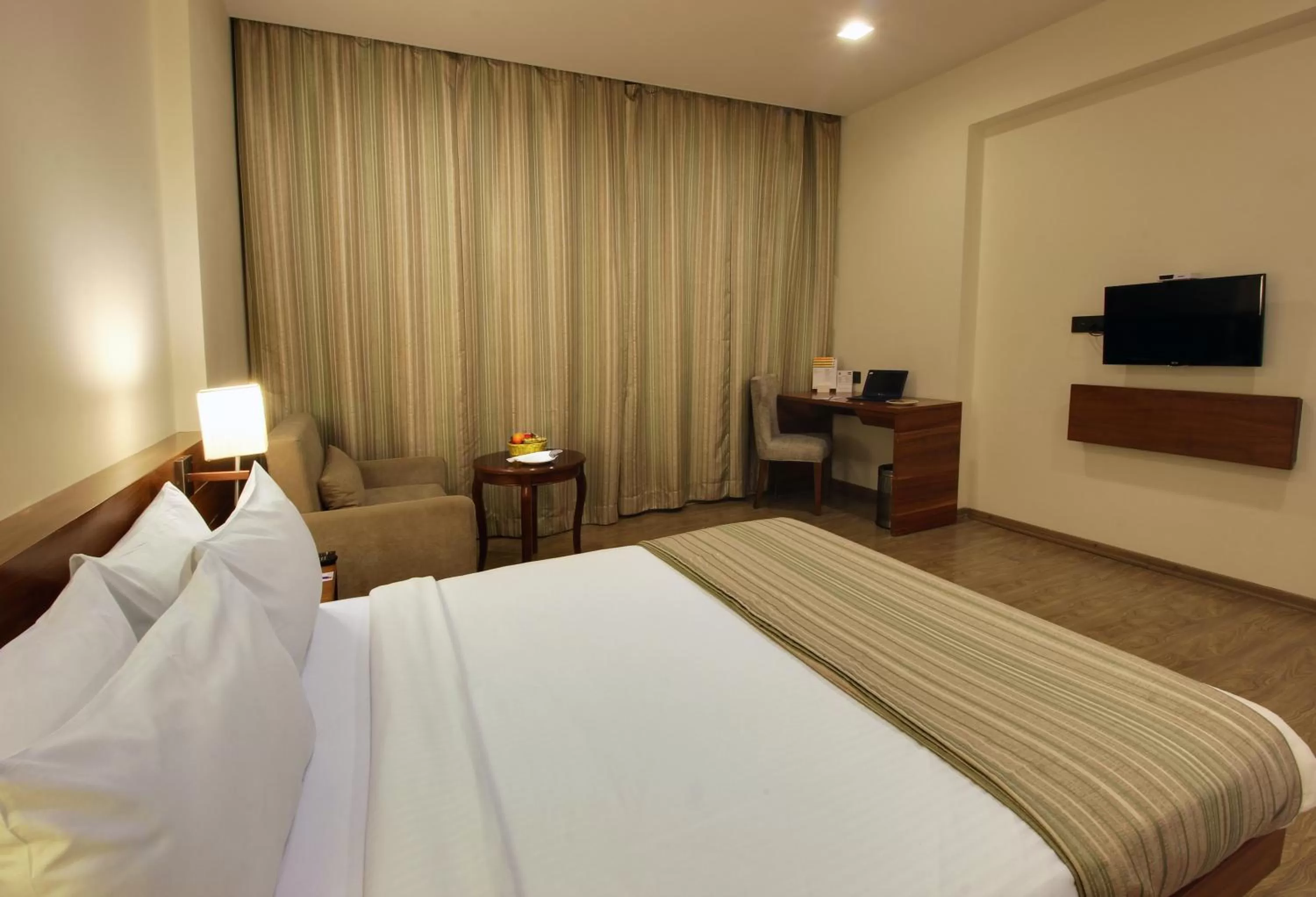 Bedroom, Bed in Temple Tree Hotel Shirdi, a member of Radisson Individuals