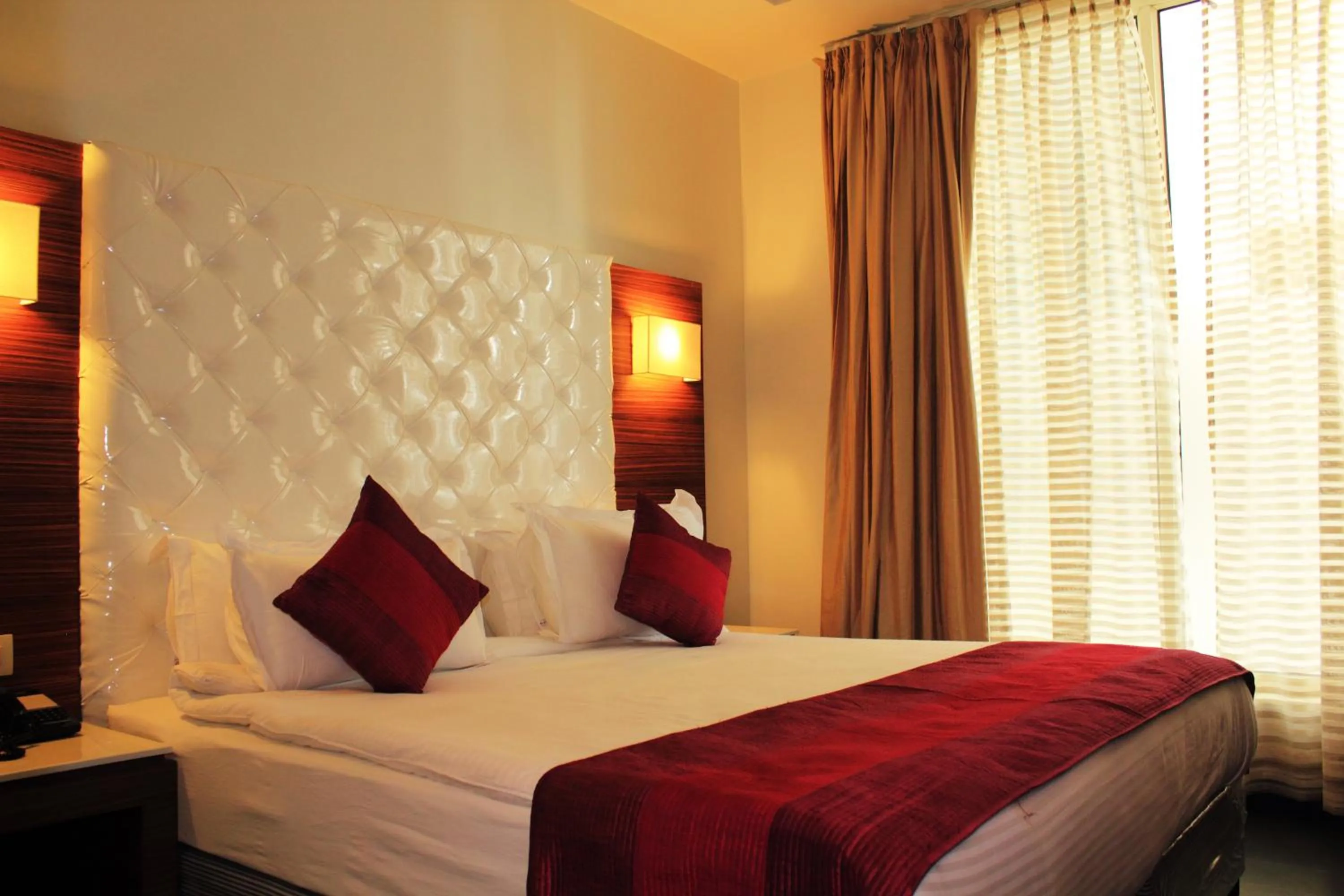 Bed in Hotel Ivory 32