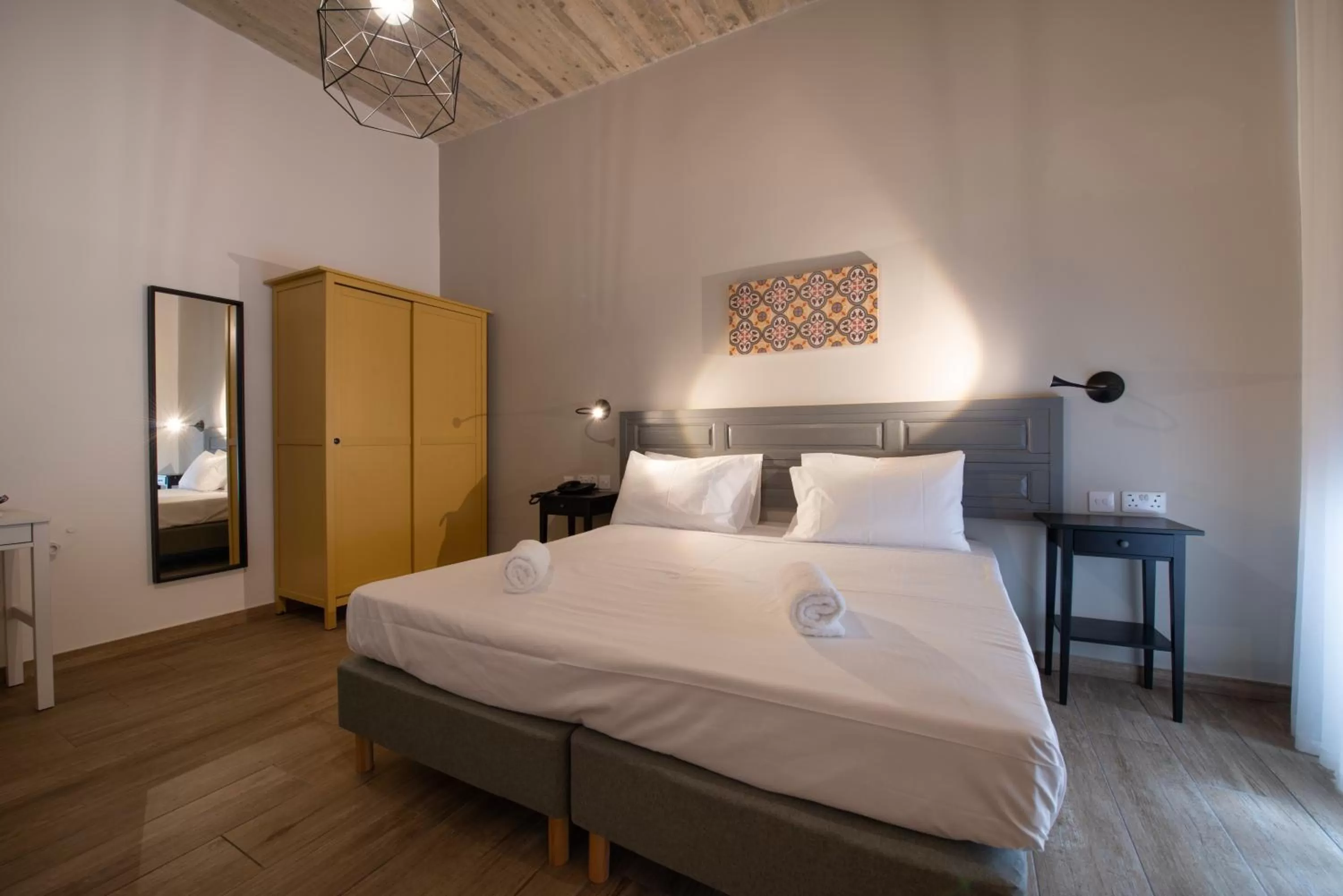 Bed in Chapter 5 Hotel