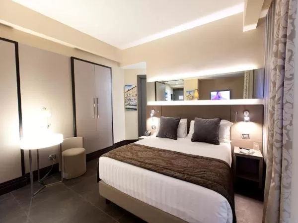 Bed in Trevi Palace Hotel