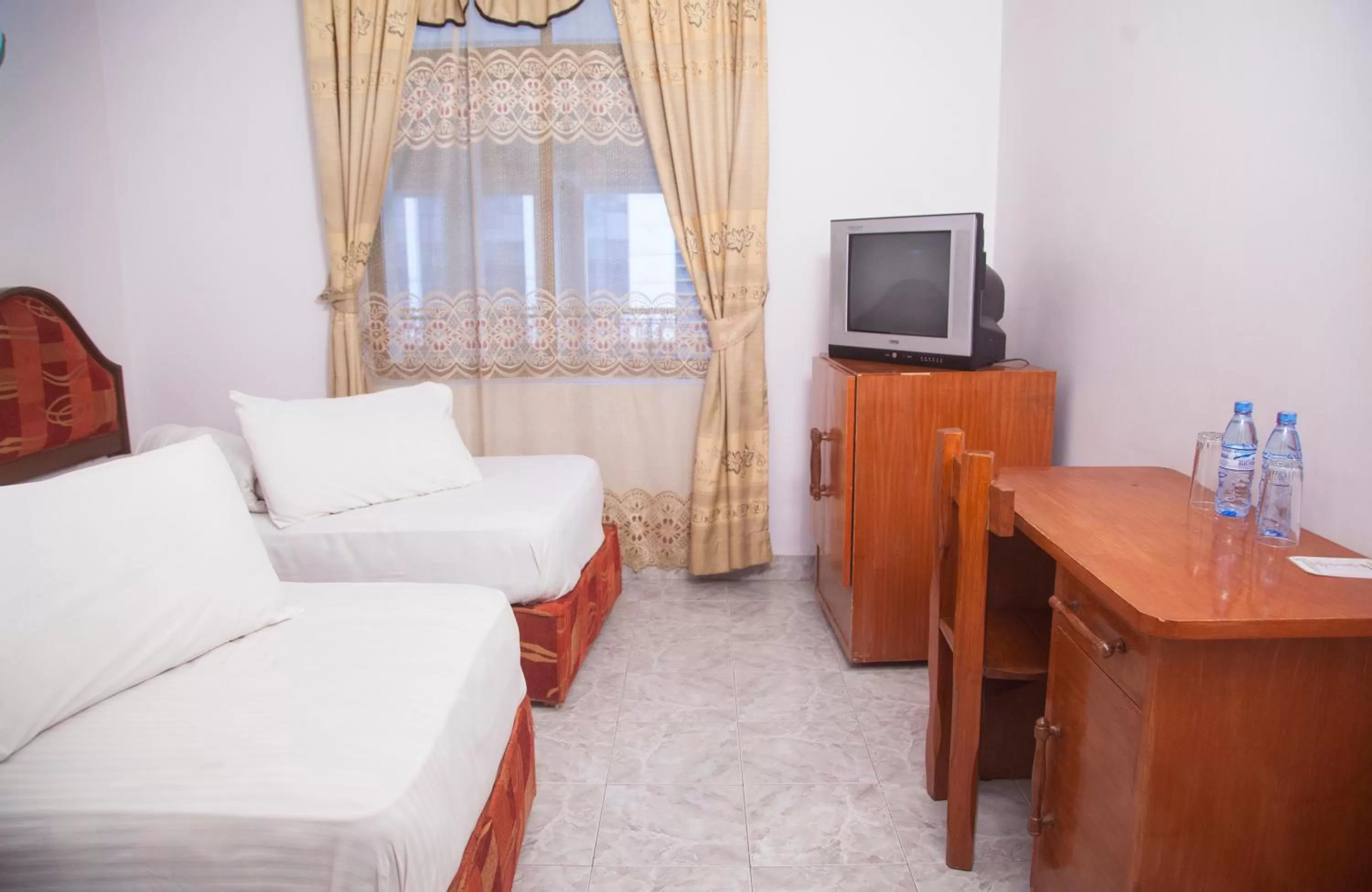 Bed in Natron Palace Hotel