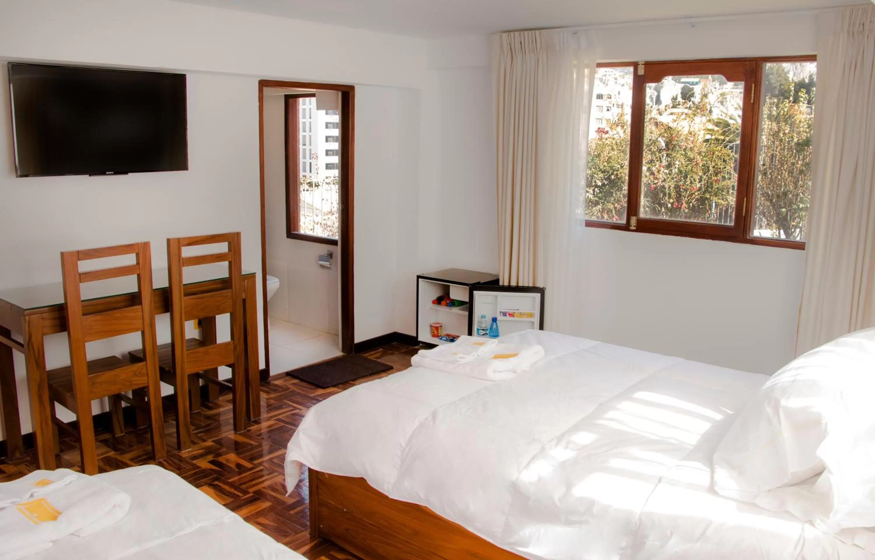 Photo of the whole room in Qhini Hotel Boutique