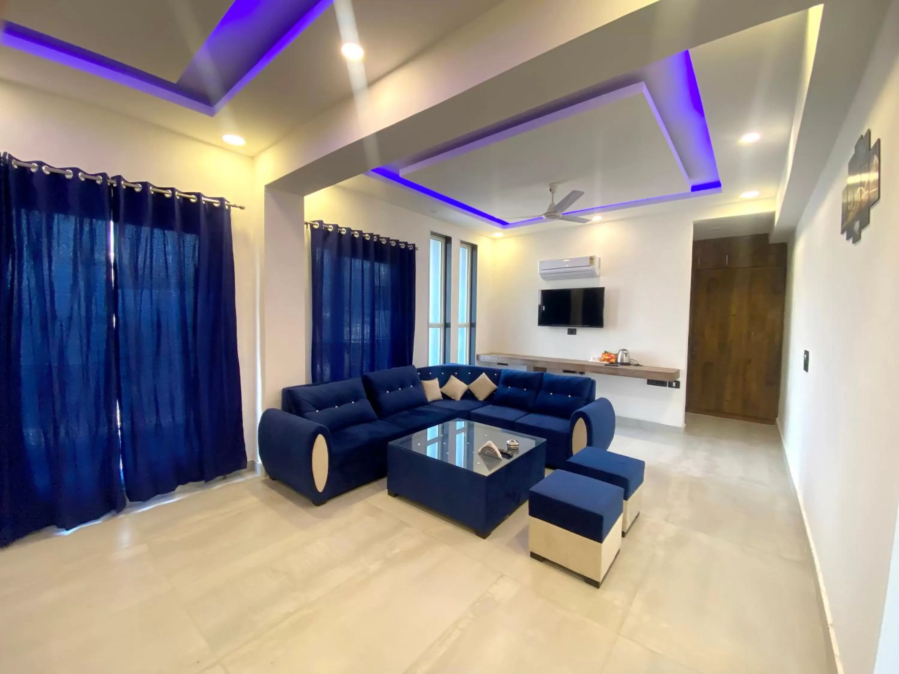 Bedroom, Seating Area in The Metro Stay By F9 Hotels-Near Sector 18 Metro Station Noida