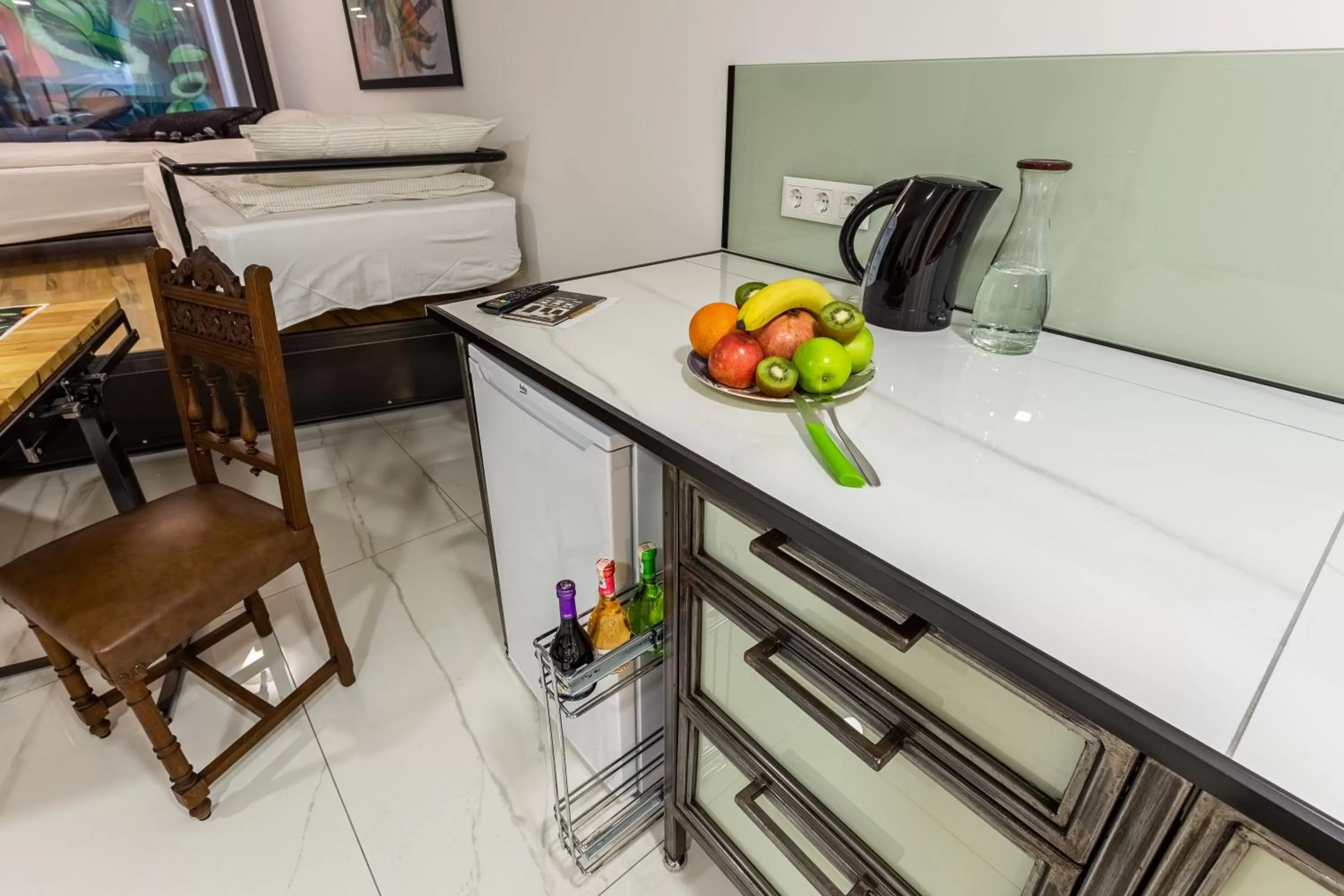 Kitchen or kitchenette in Villa Pera Suite Hotel