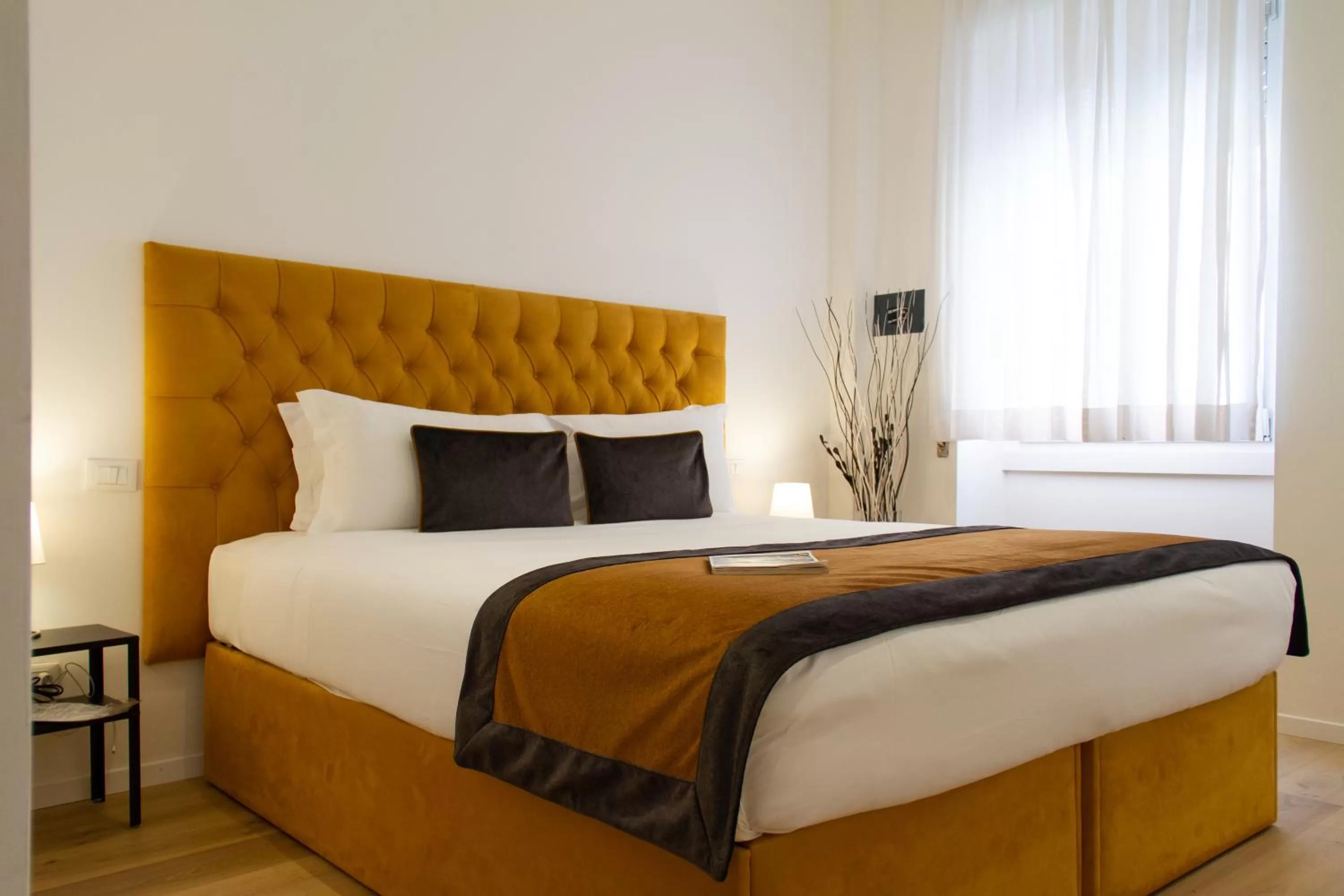 Bed in Michelangelo Vatican Rooms