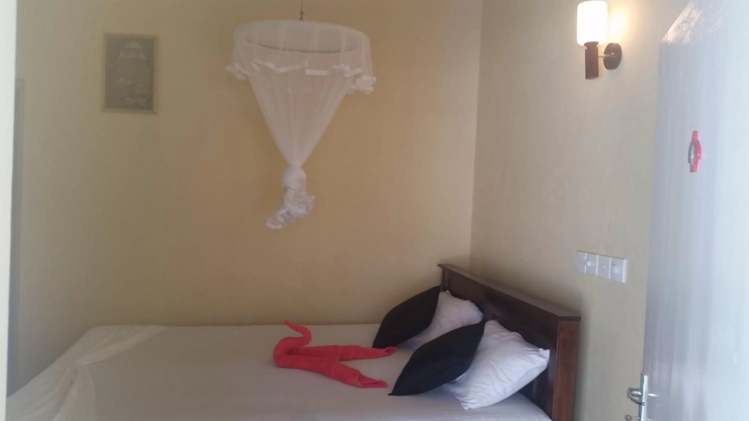 Bed in Turtle Reef Guest