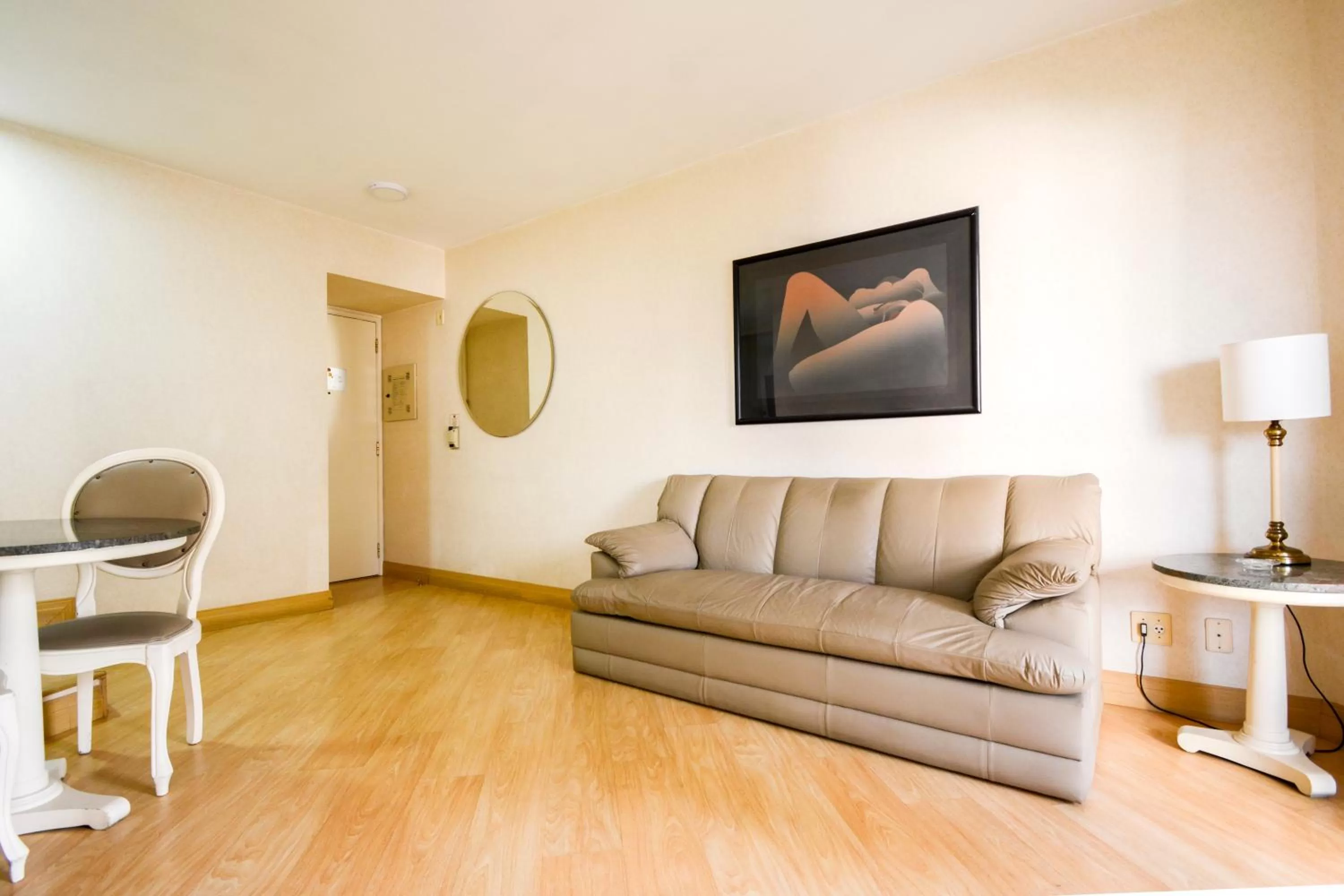 Living room, Seating Area in Wall Street Apartments by BnbHost