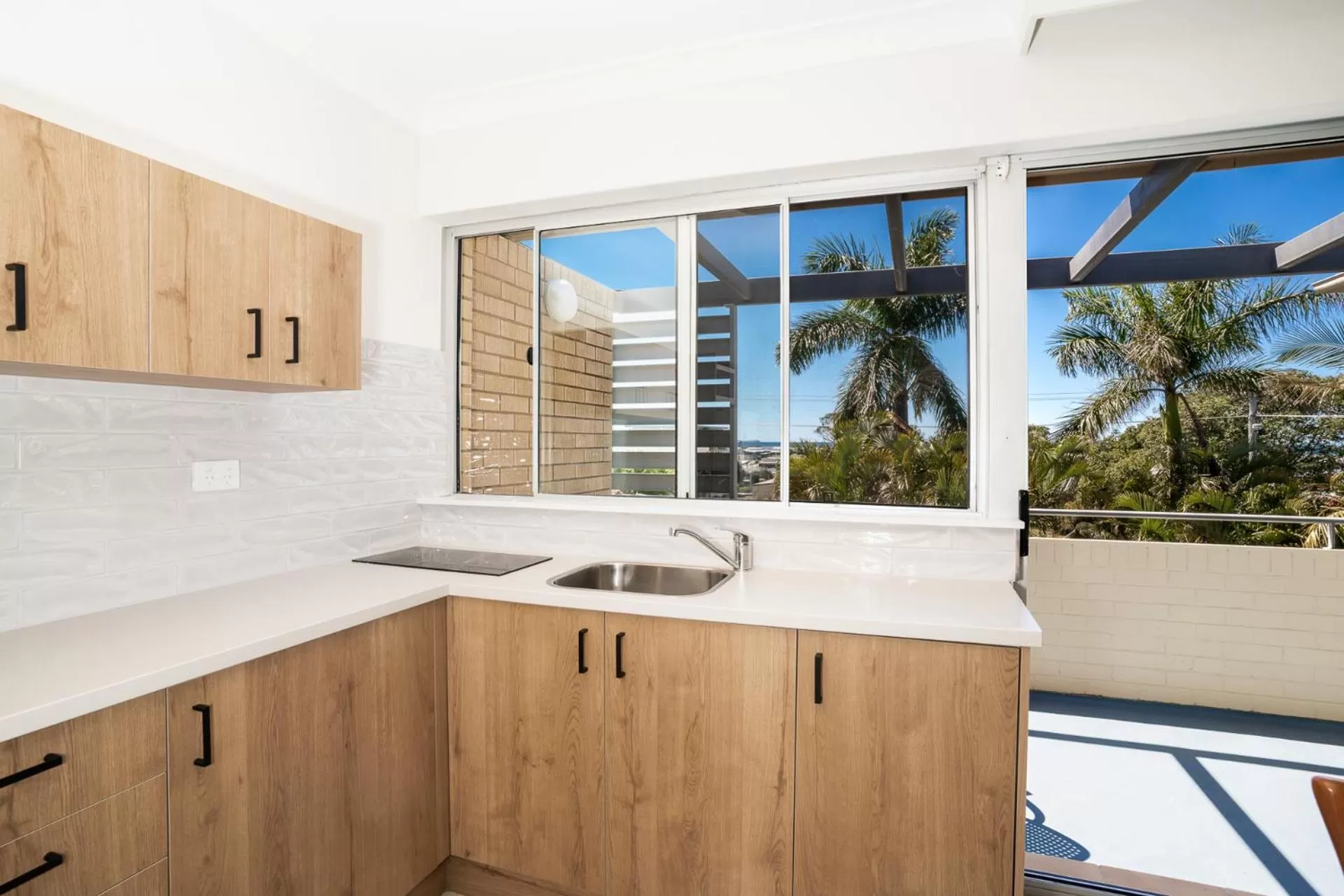 Kitchen or kitchenette in Caribbean Motel