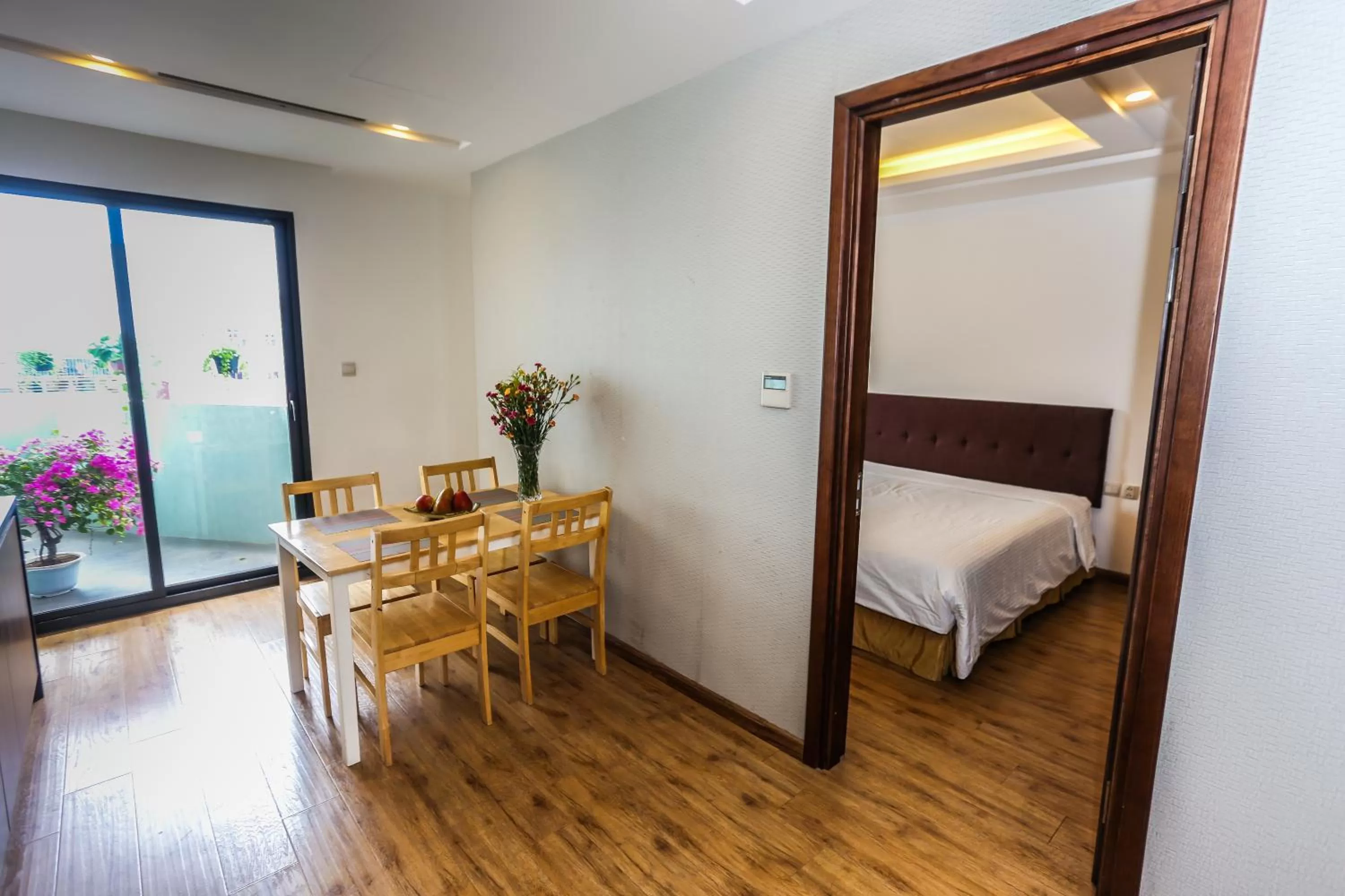 Dining area, Bed in HNC Premier Hotel & Residences