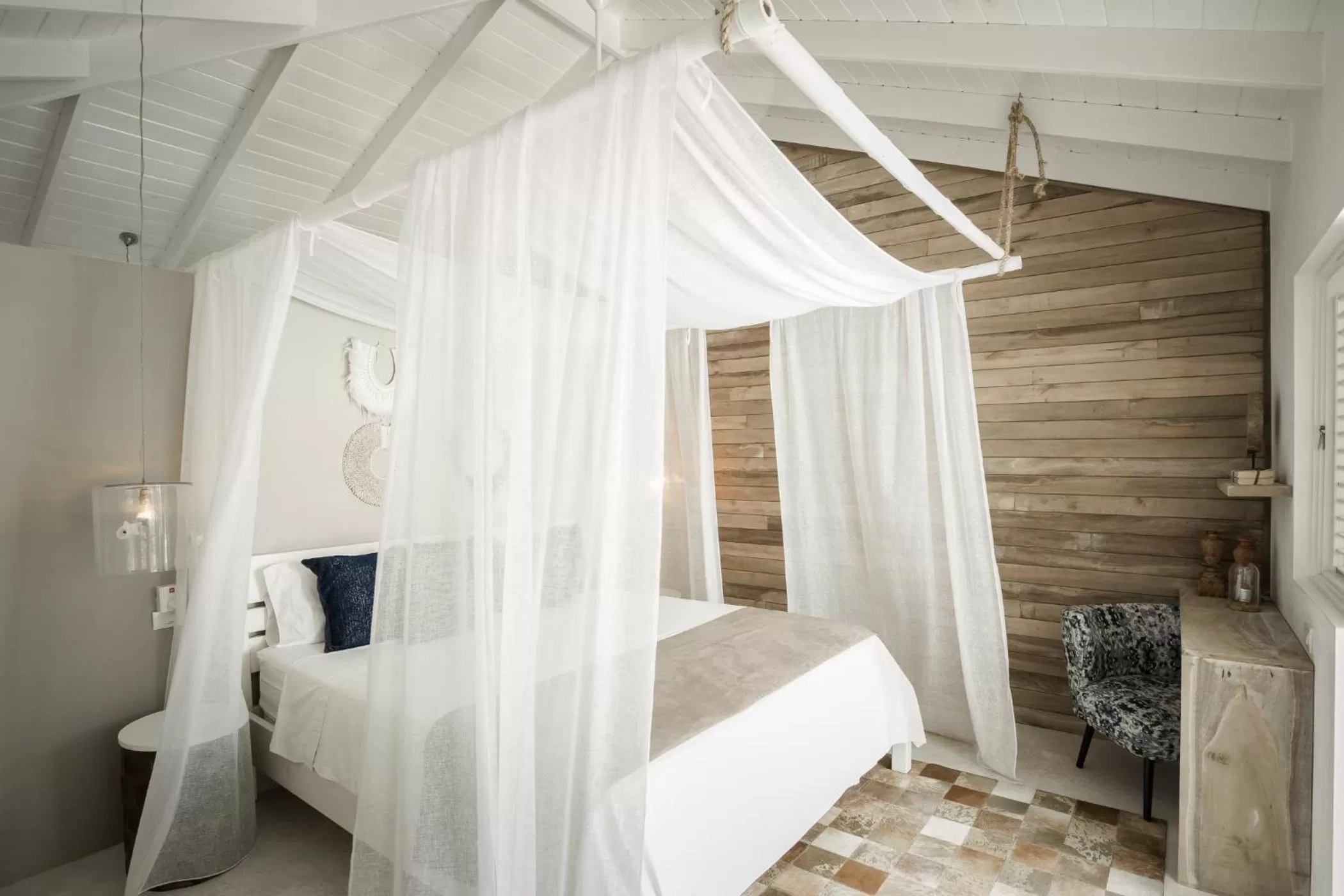 Bed in Mahona Boutique Hotel