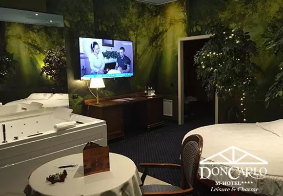 Bed in Hotel Don Carlo