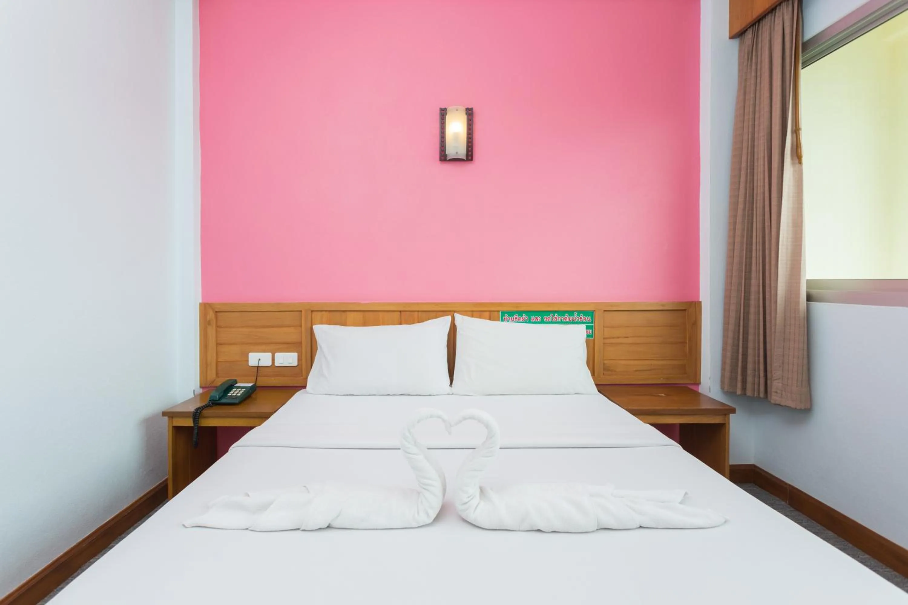 Bed in Riverside Hotel