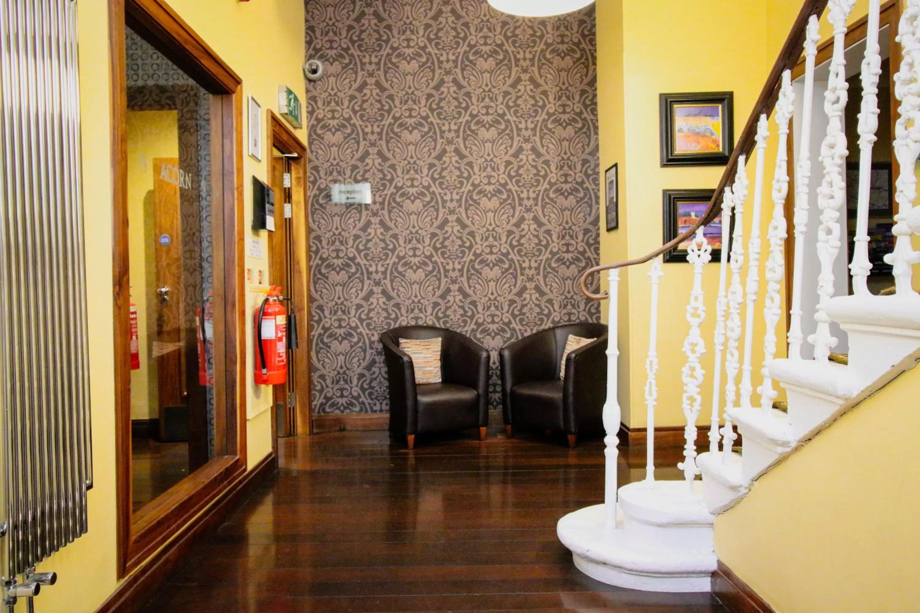 Seating area, Lobby/Reception in Acorn Hotel