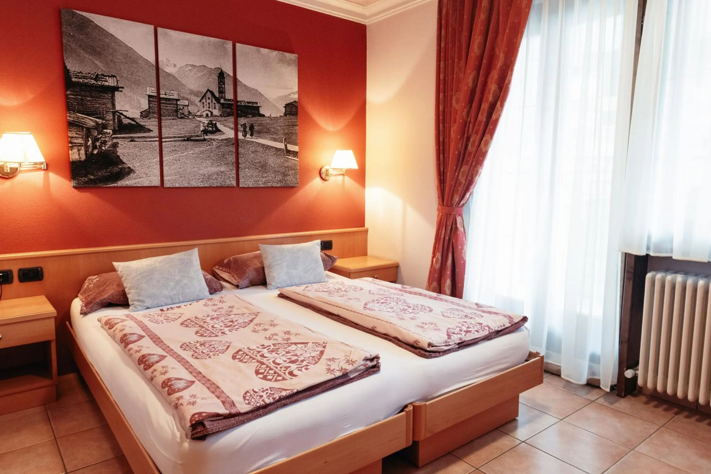 Bed in Hotel Garni Rin Da Rin