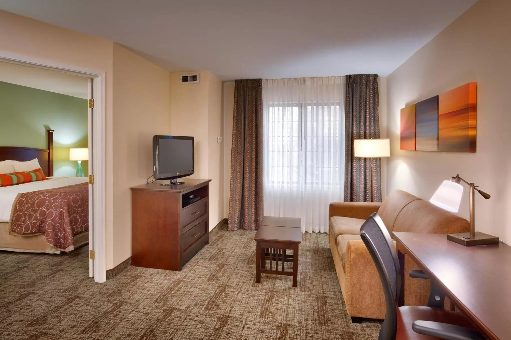 Bedroom, Bed in Staybridge Suites Peoria Downtown by IHG