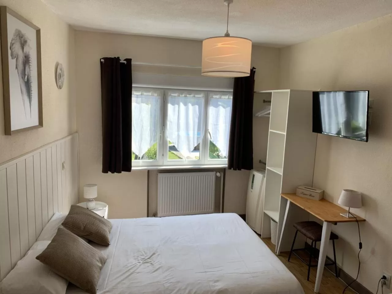 Bed in Hôtel Le P'tit Monde