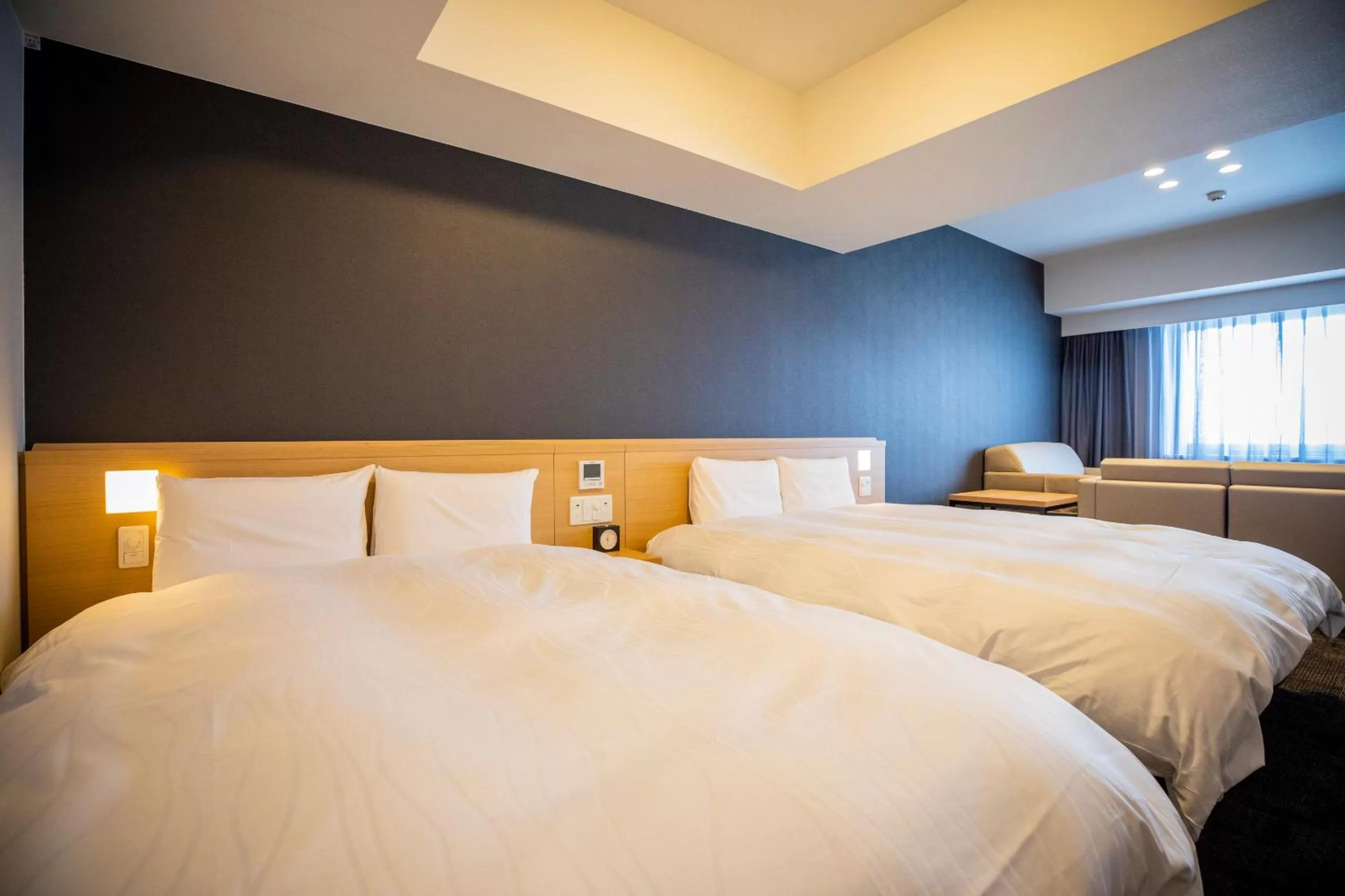 Photo of the whole room, Bed in La Vista Furano Hills Natural Hot Spring