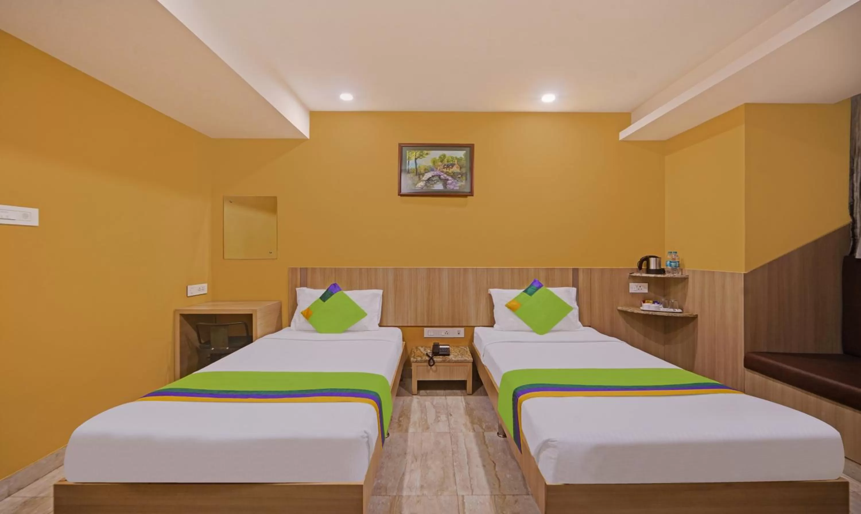 Bedroom, Bed in Treebo Fourth Avenue