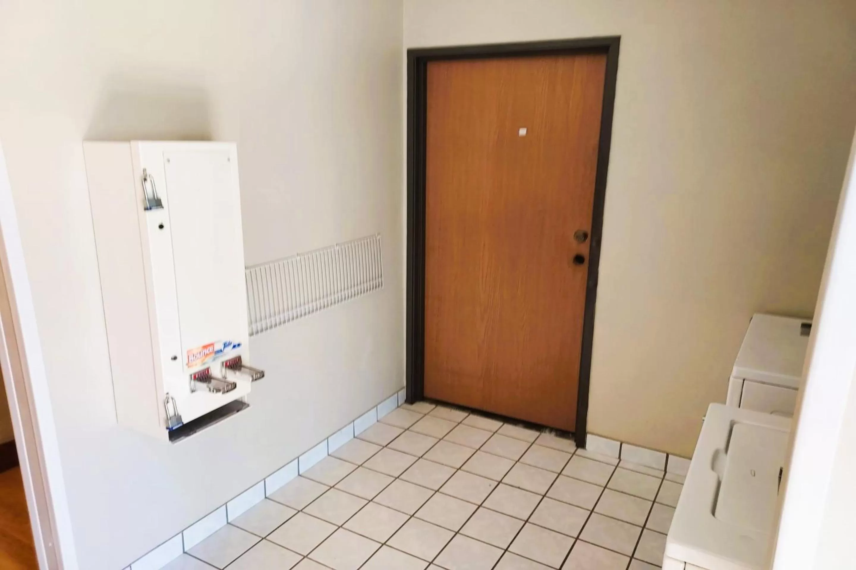 laundry in McPherson Inn By OYO, I-135