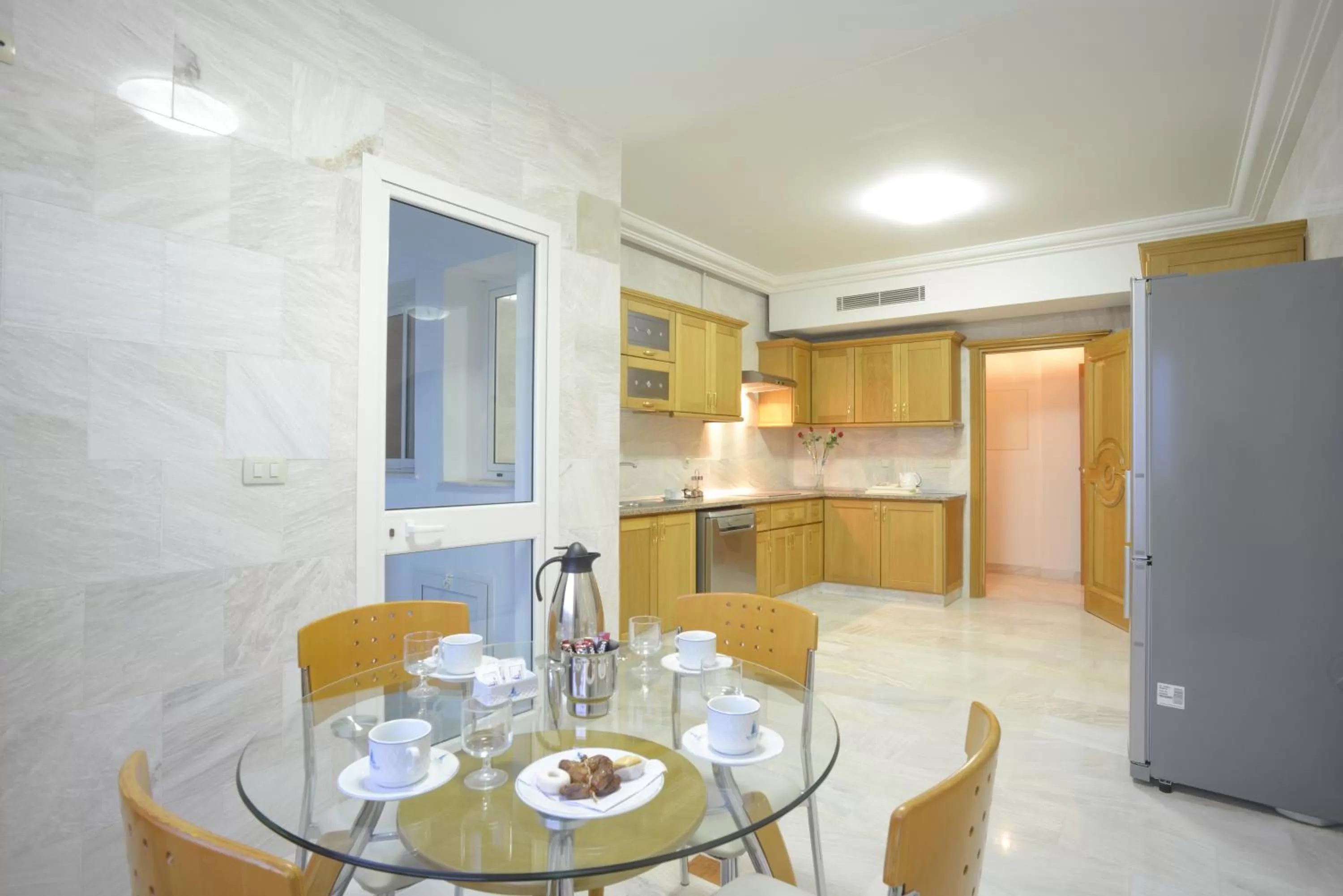 Kitchen or kitchenette in The Penthouse Suites Hotel