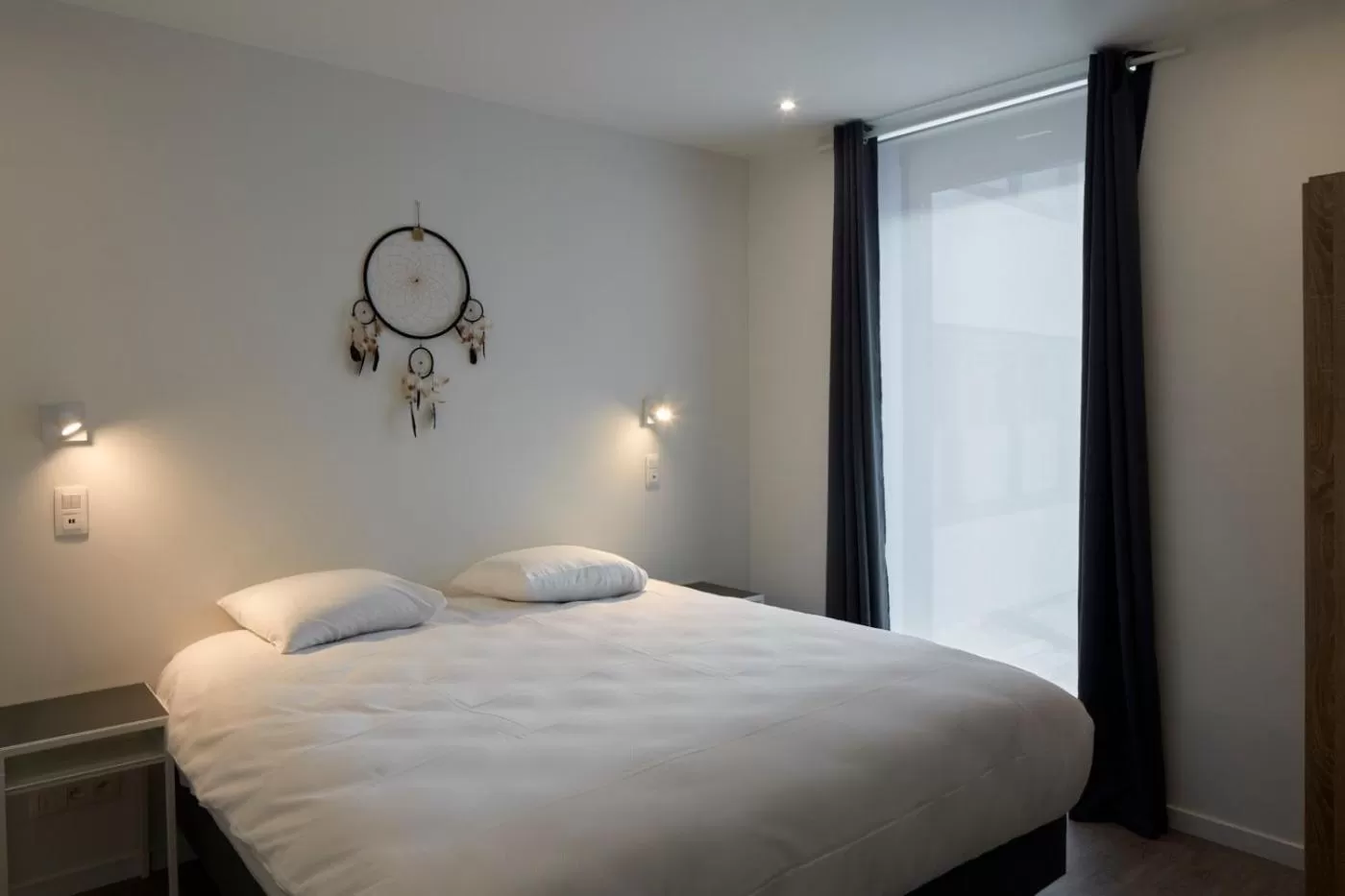 Bed in Alpha Hotel and Aparthotel