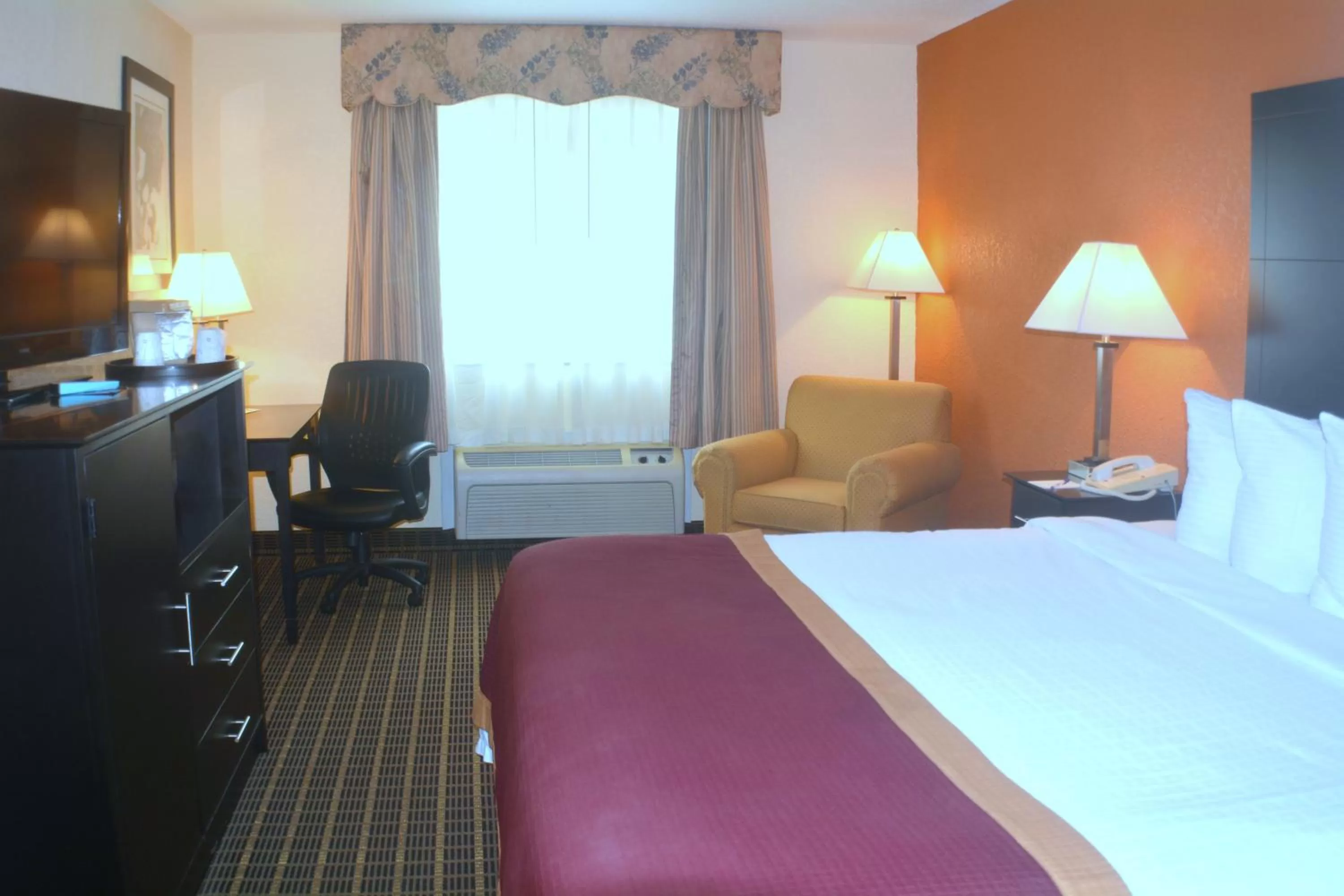 Bed in Baymont by Wyndham Muskegon