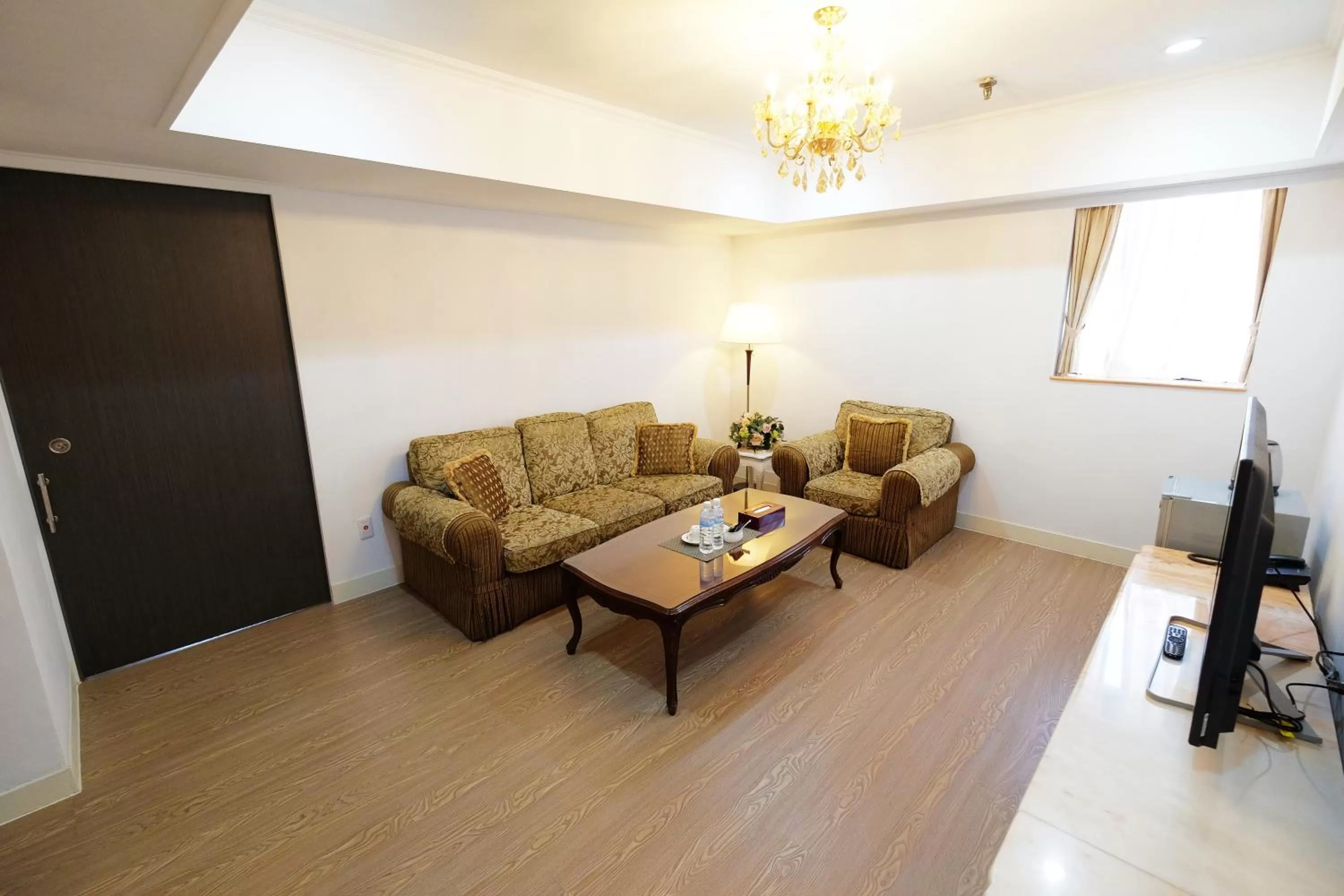 Living room in Dynasty Hotel