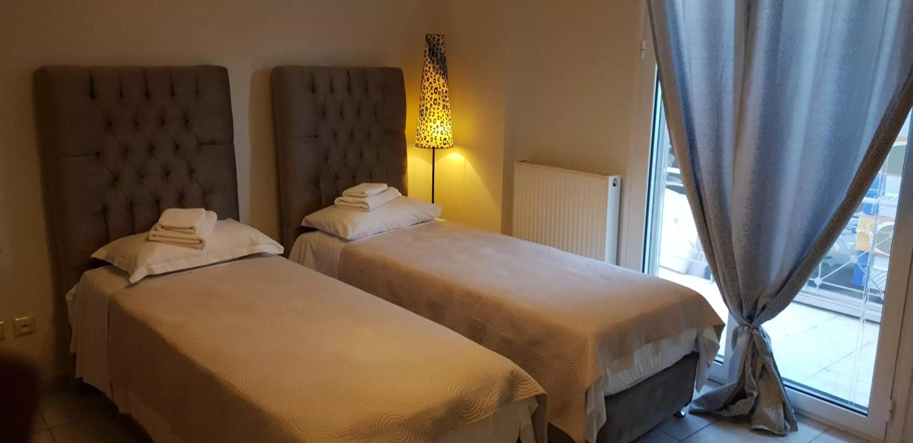 Bed in Alexia's Apartments