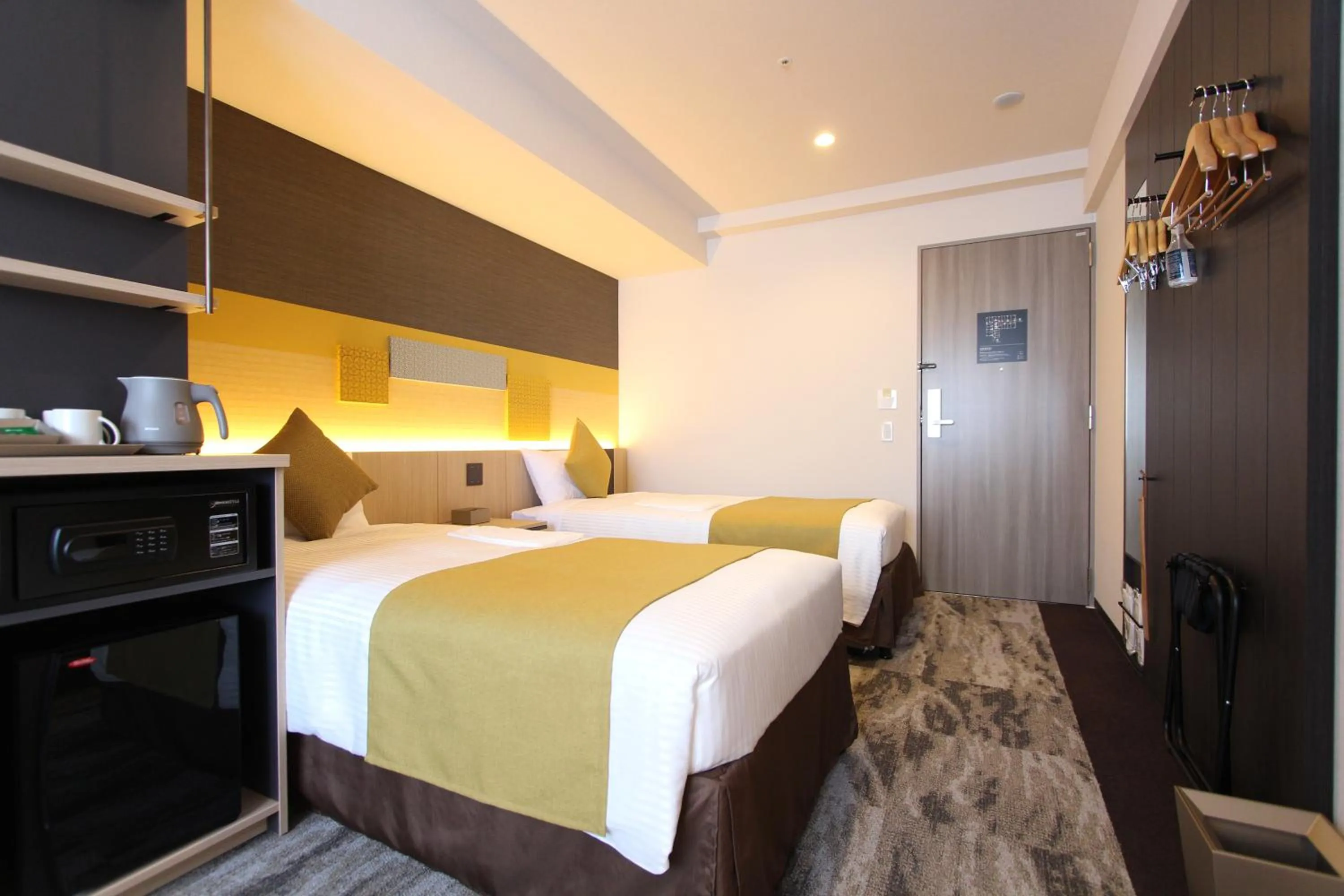 Bed in KOKO HOTEL Tsukiji Ginza