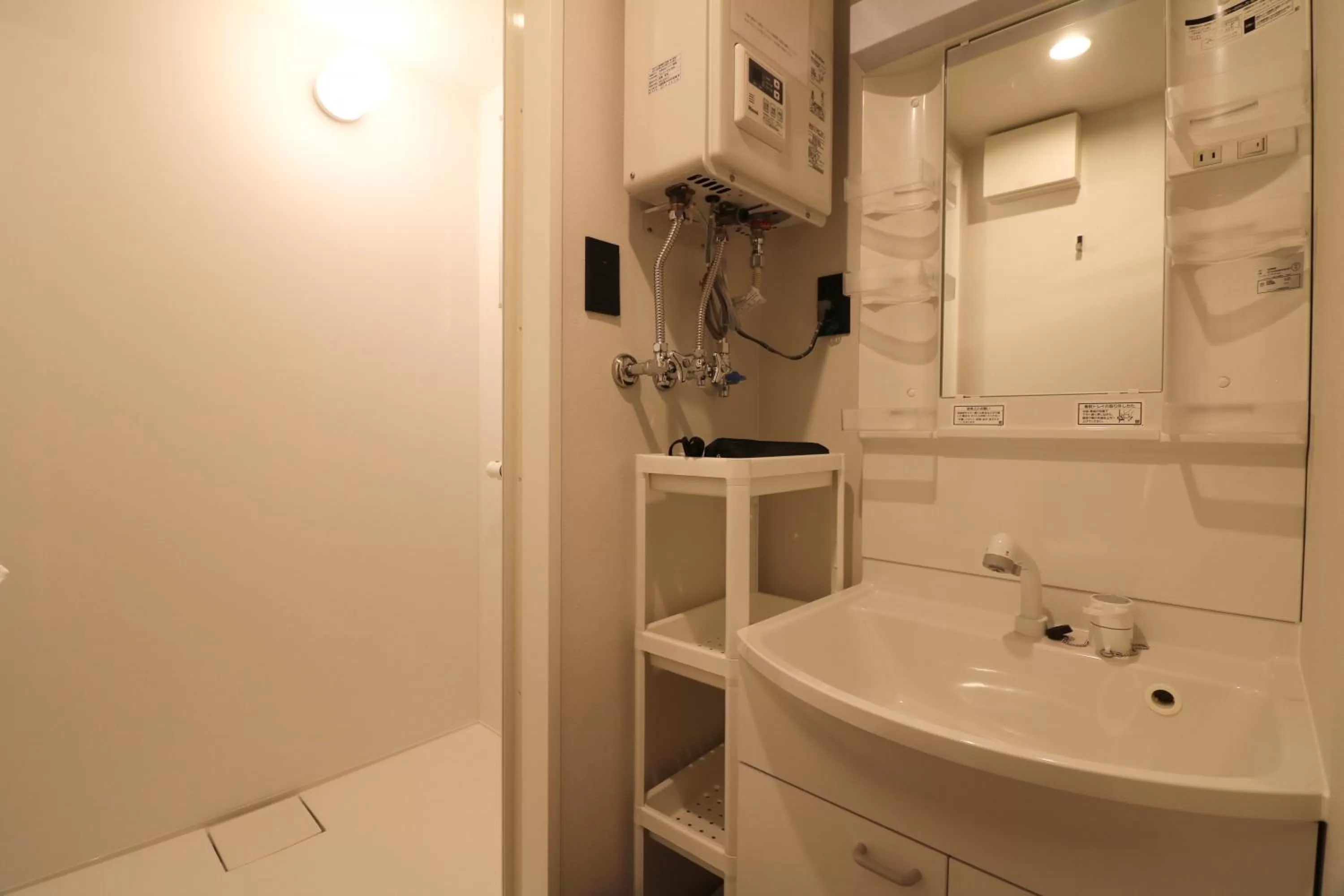 Shower in TAKETO STAY PREMIERE SAPPORO Eki