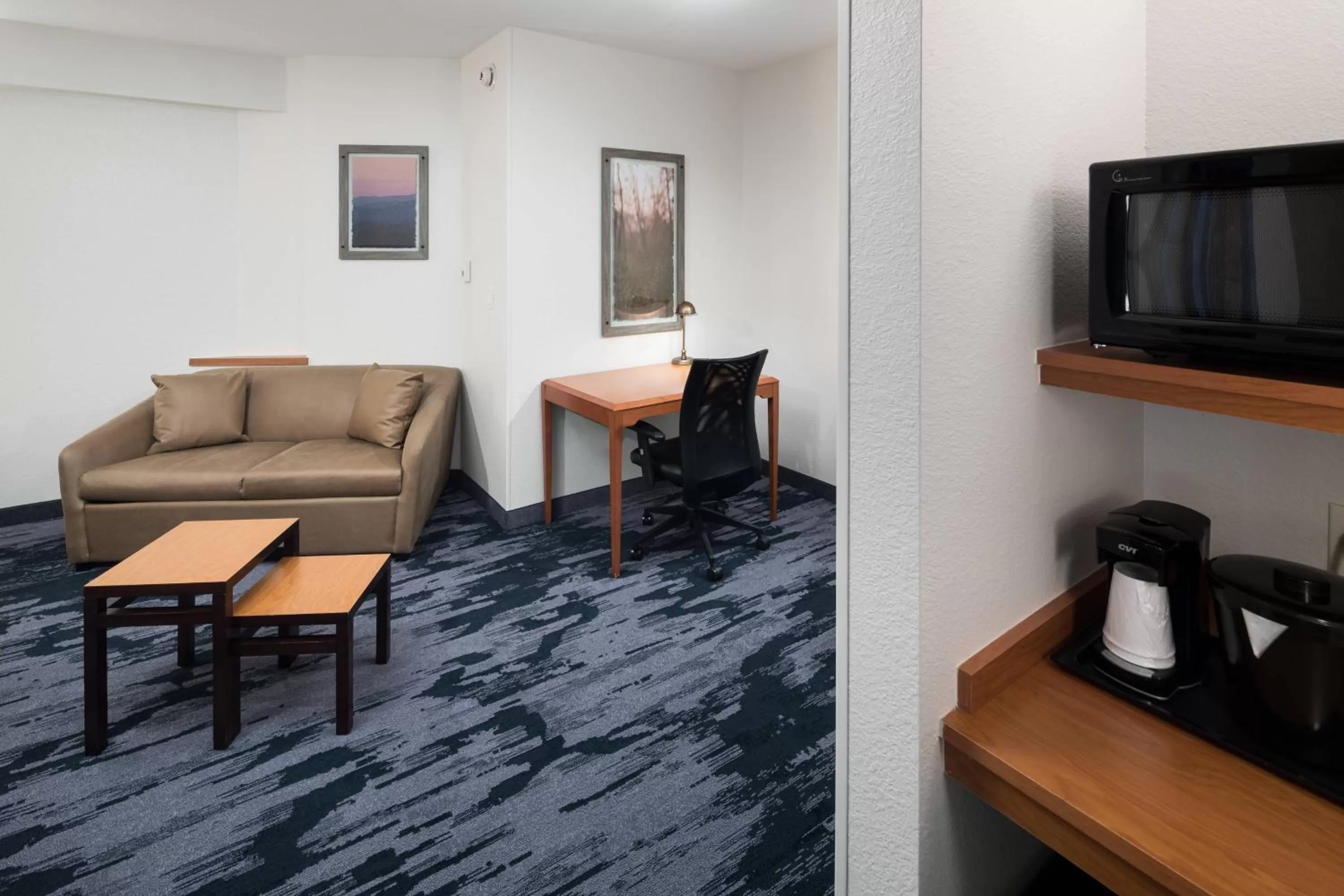 Living room in Fairfield Inn Suites by Marriott Orlando At SeaWorld