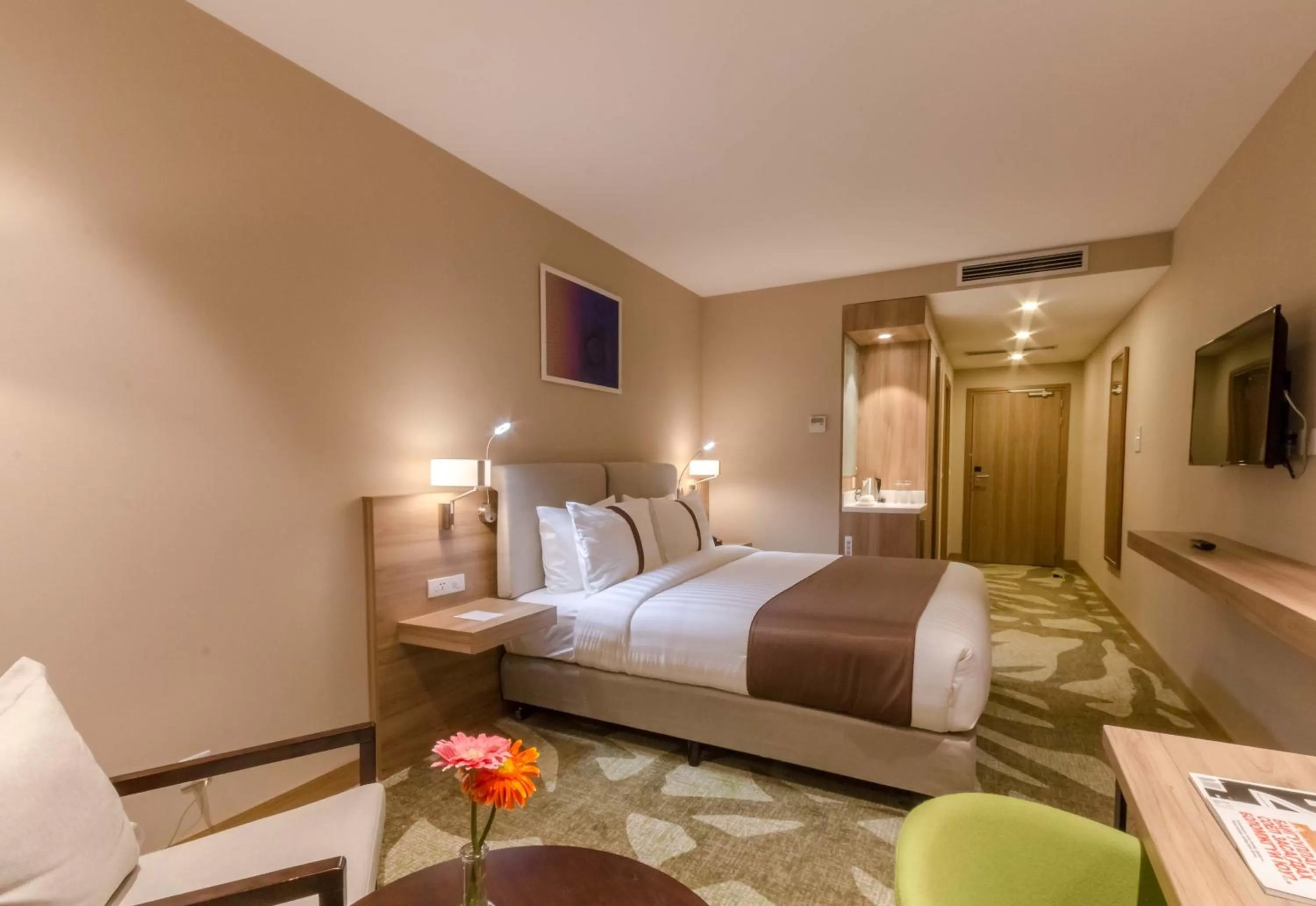 Communal lounge/ TV room, Bed in Holiday Inn Ulaanbaatar by IHG