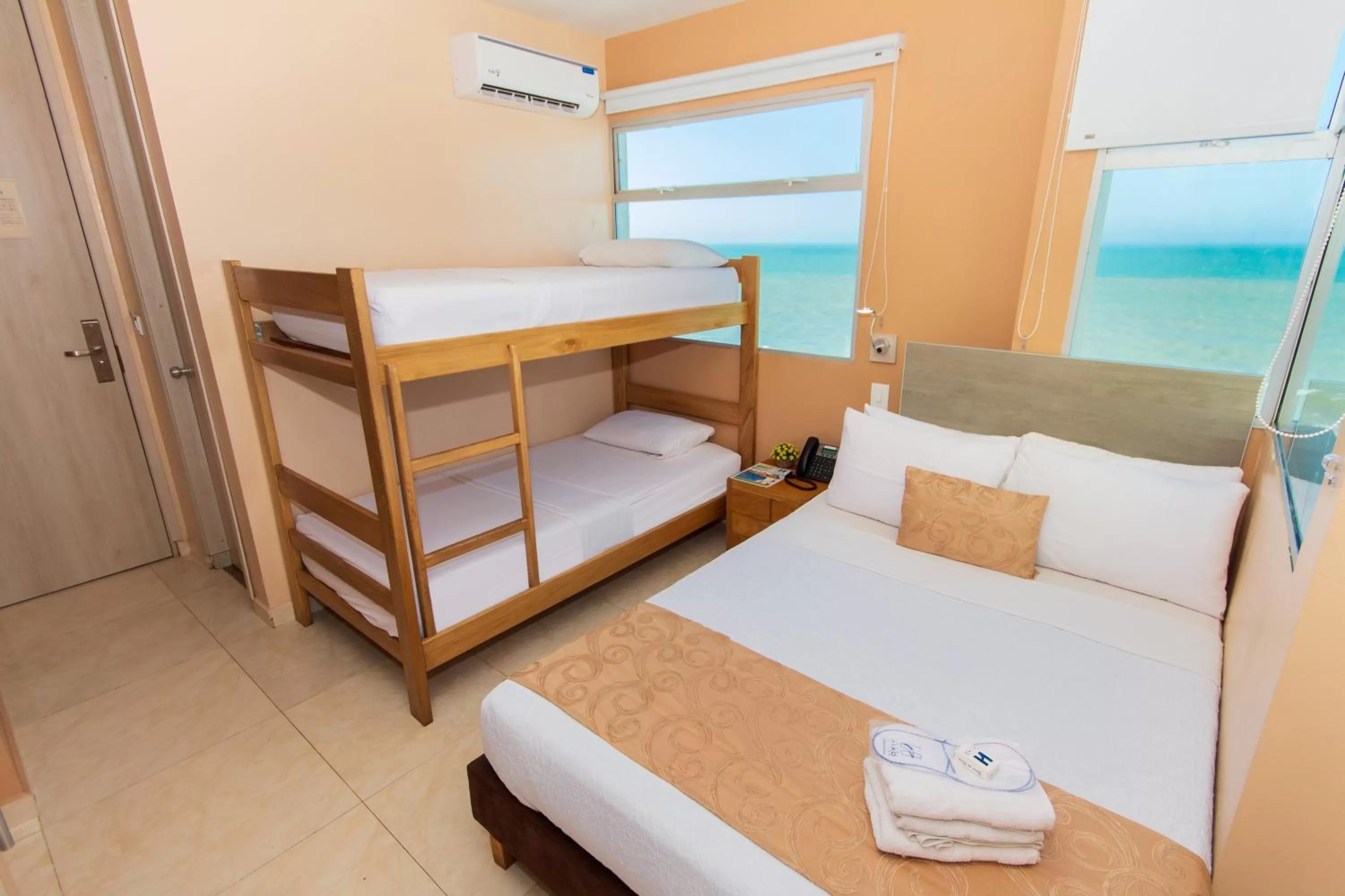 Bedroom in Hotel Aixo Suites By GEH Suites