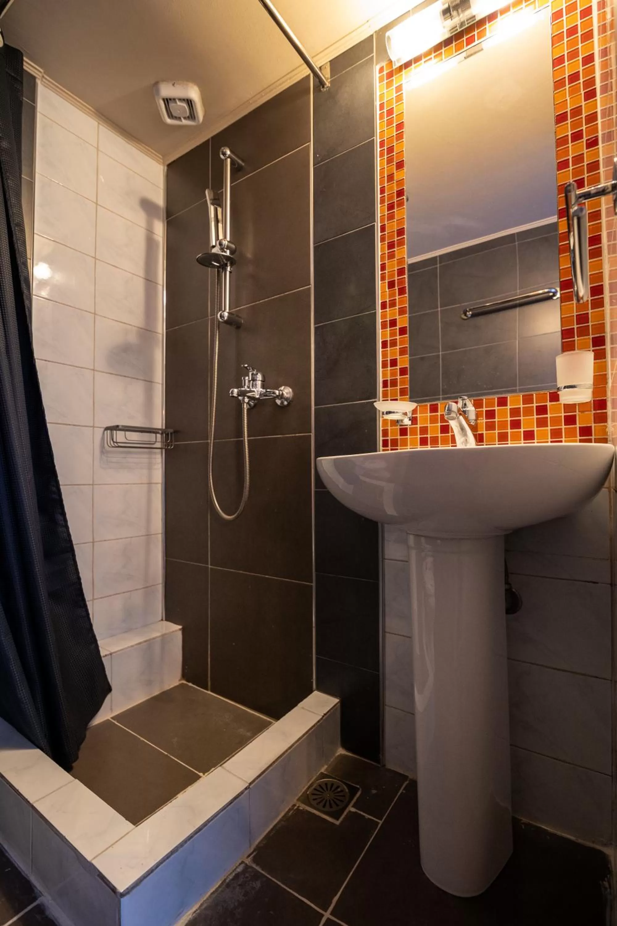 Shower in Votsalakia Hotel & Luxury Apartments