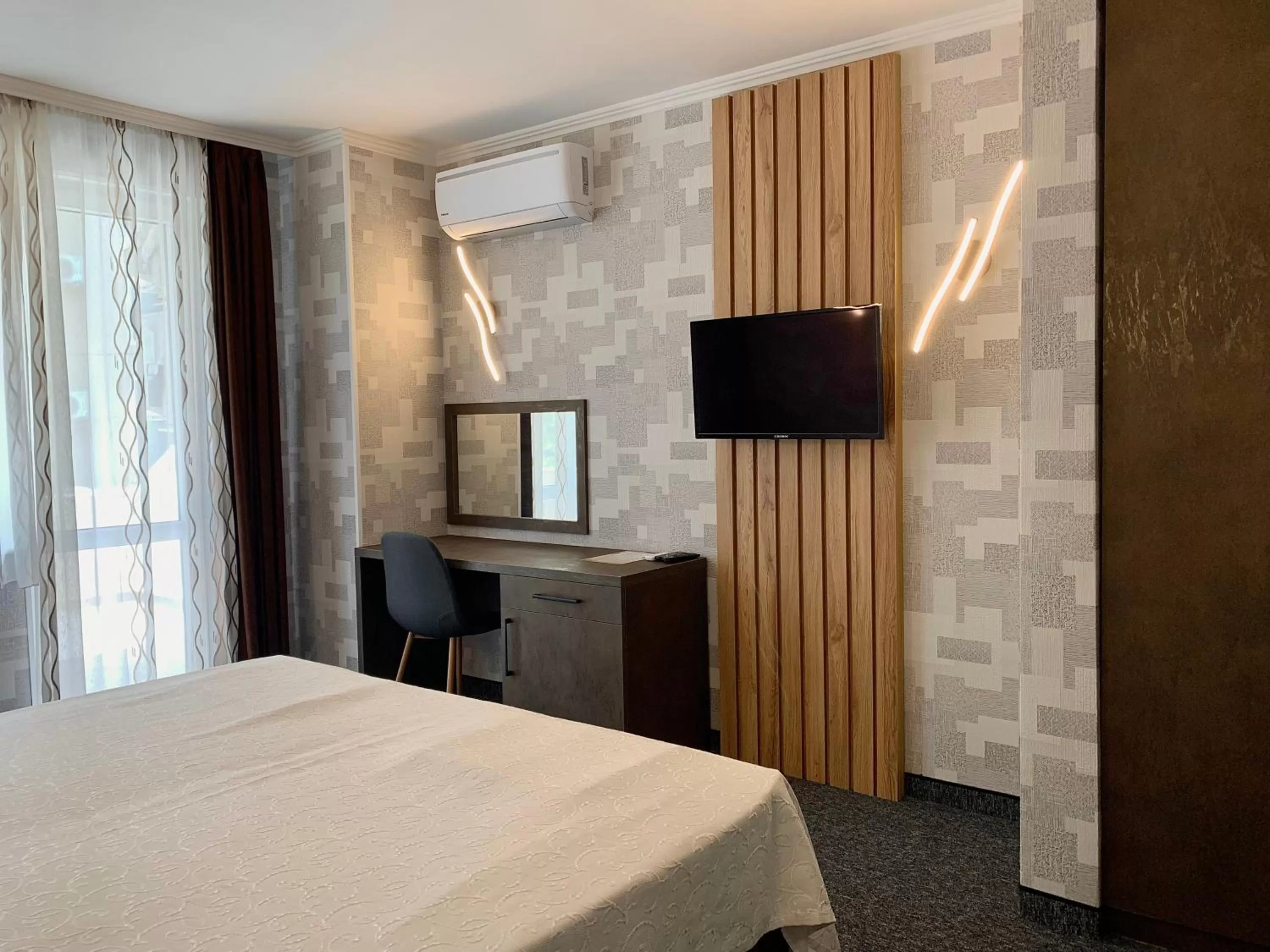 Photo of the whole room, TV/Entertainment Center in Hotel Trayana