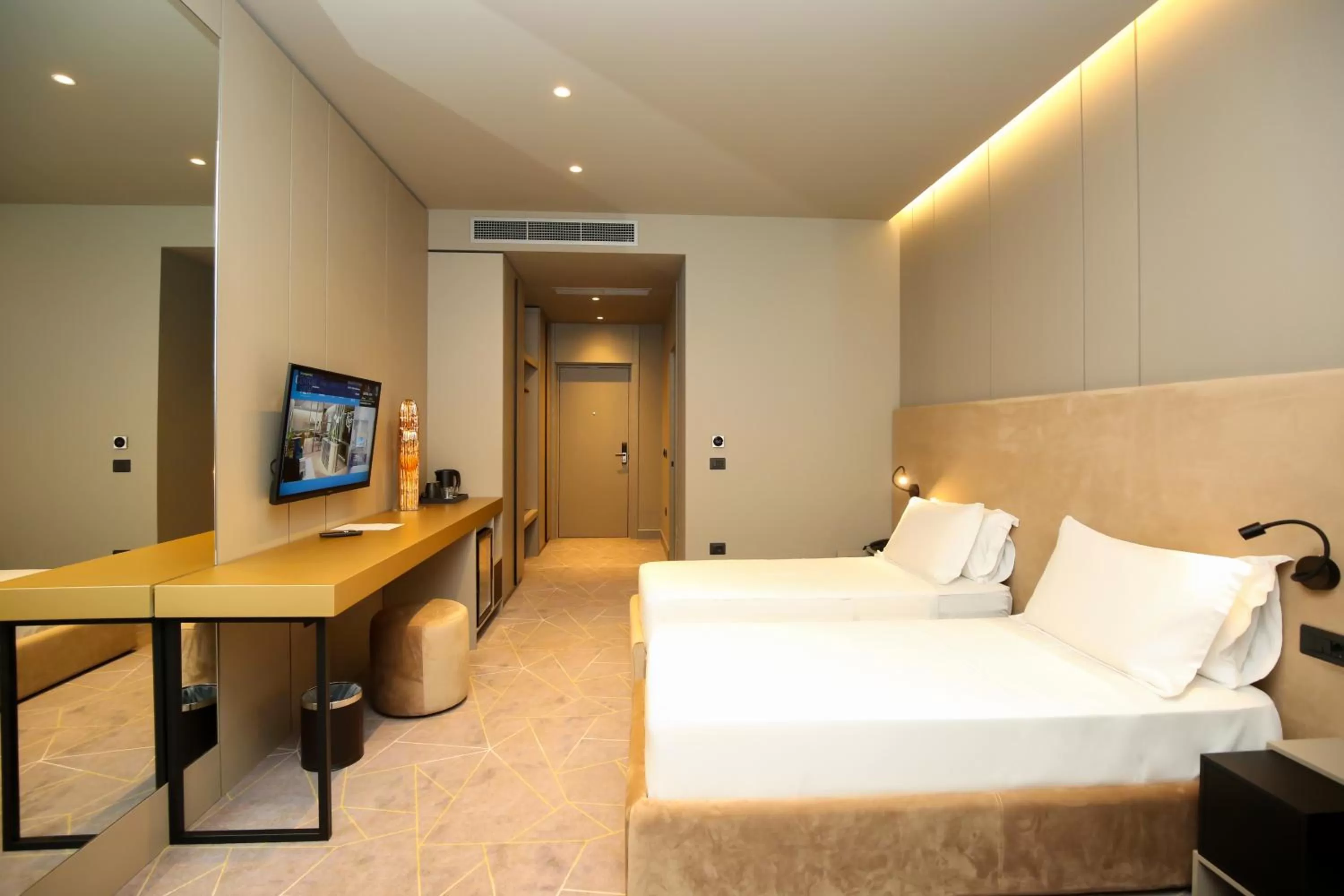 Communal lounge/ TV room in The Central View Boutique Hotel