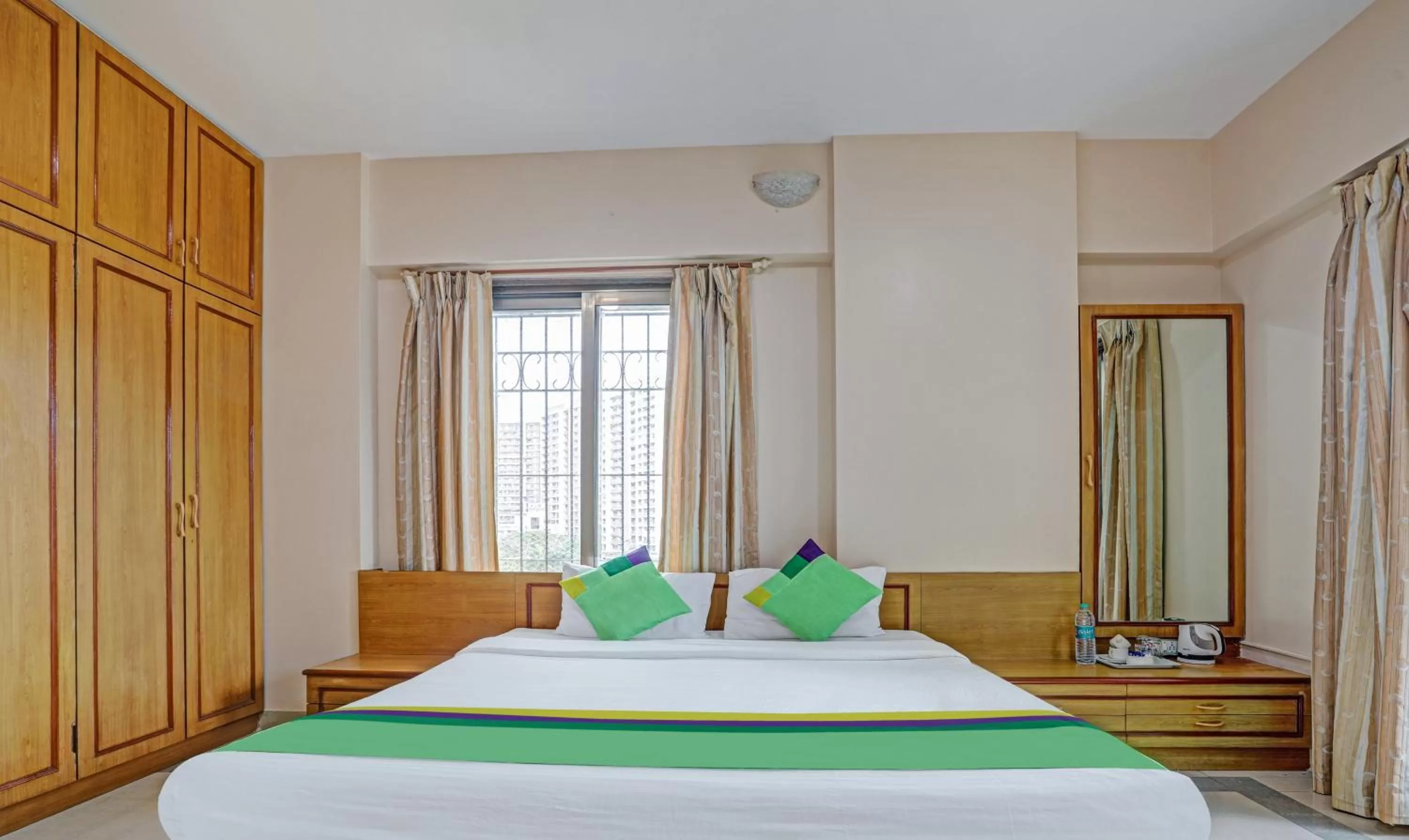 Bed in Treebo Trend Welcome Apartments